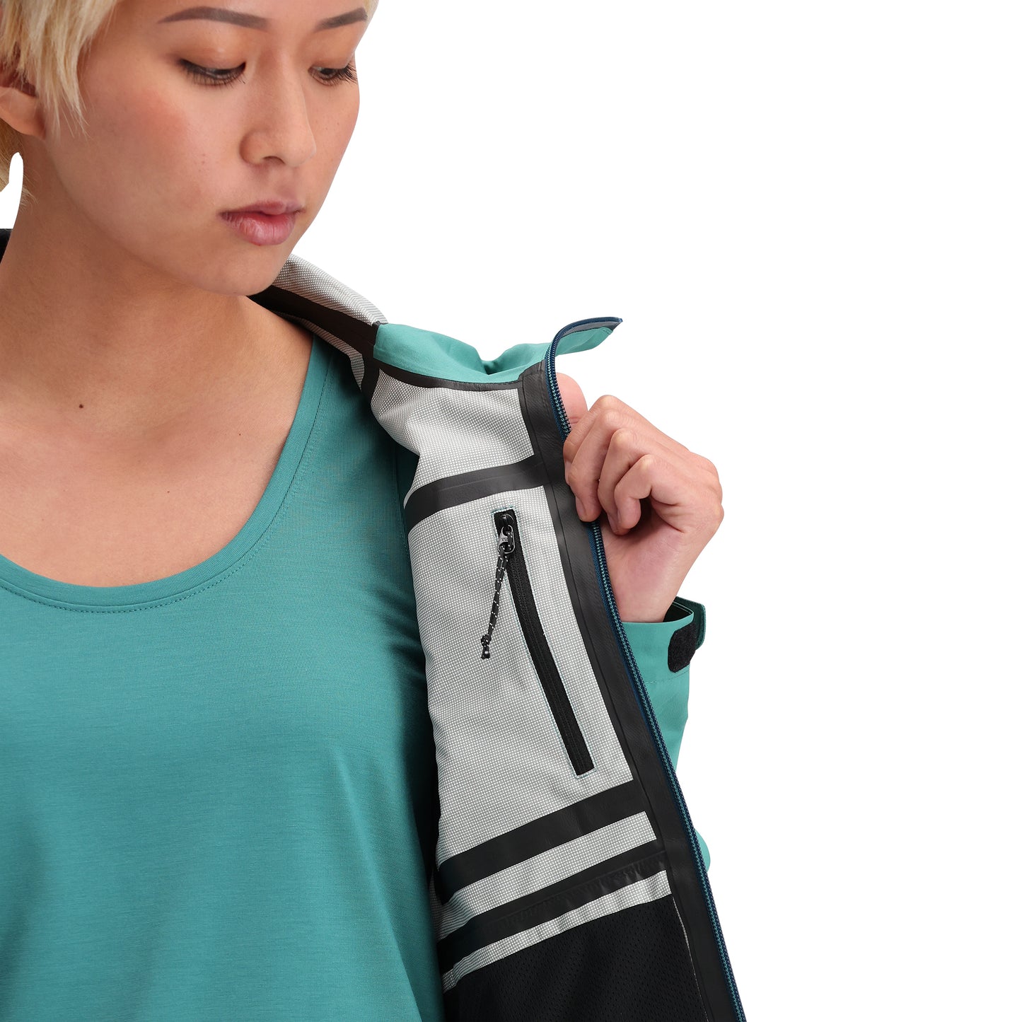 Detail shot of Topo Designs Global Jacket - Women's in "Caribbean" "Ash Green"