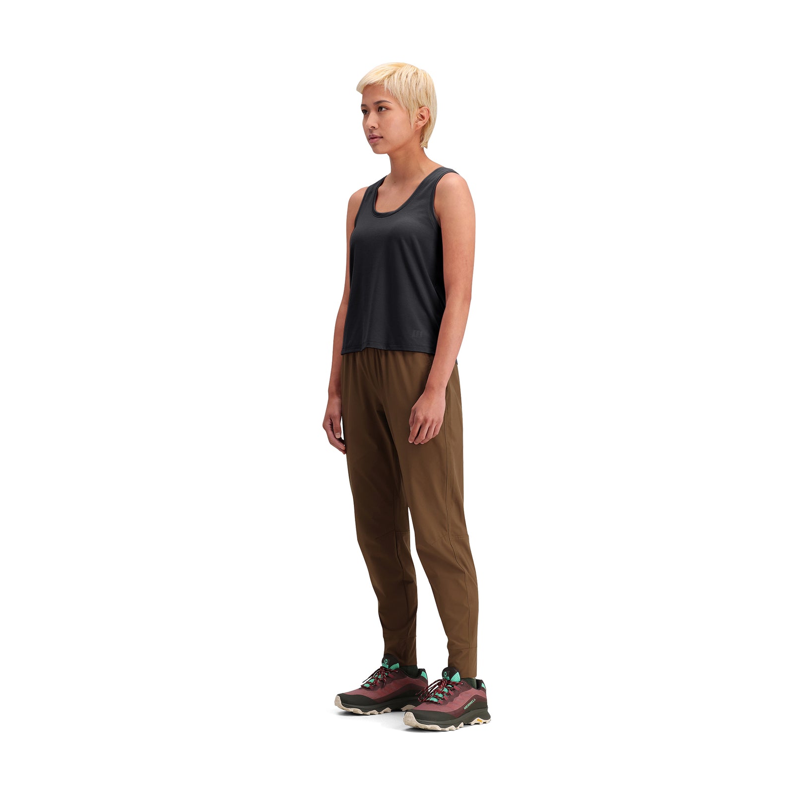 General side model shot of Topo Designs Global Jogger - Women's in "Desert Palm"