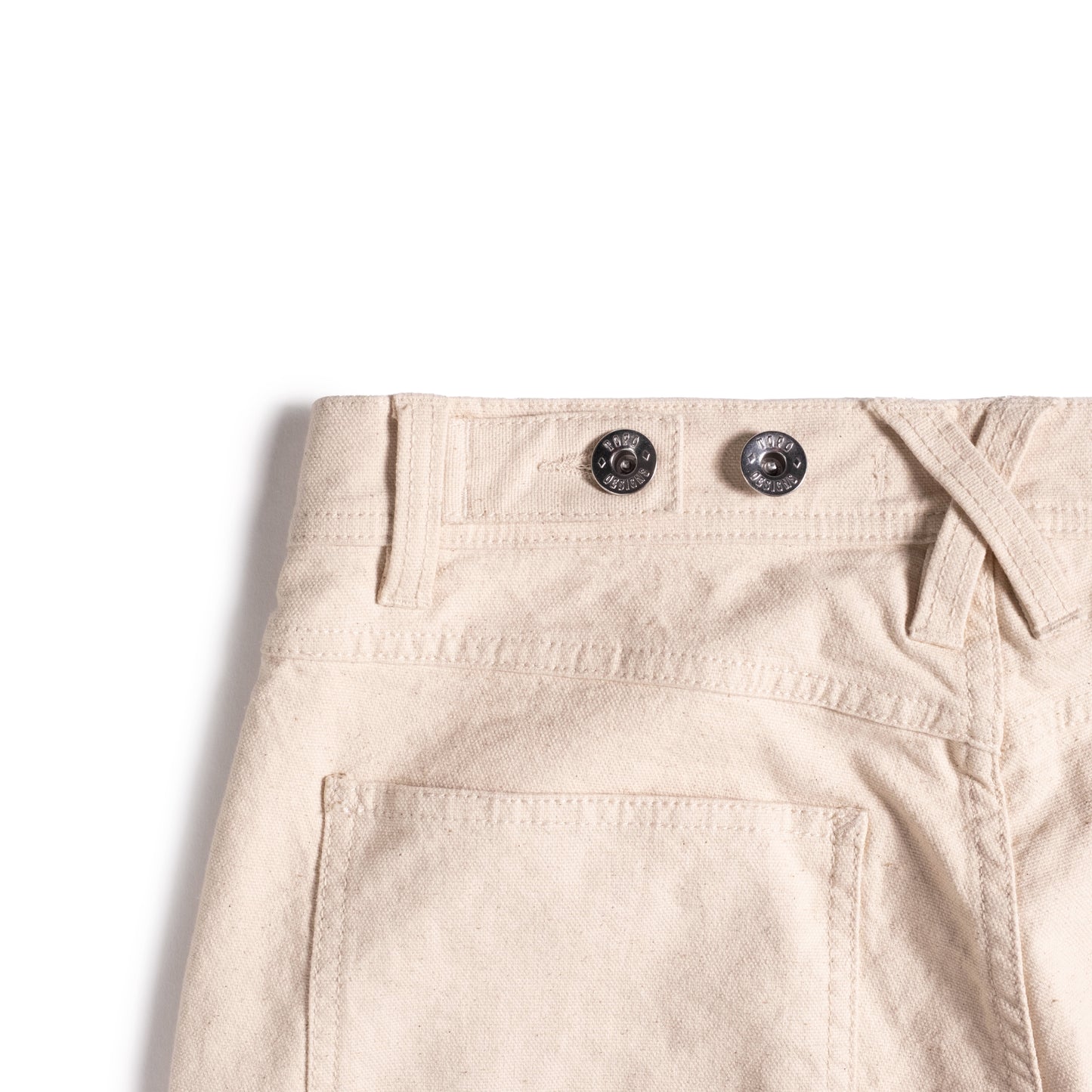 Back detail shot of Topo Designs Utility Pants Undyed - Women's in "Undyed"