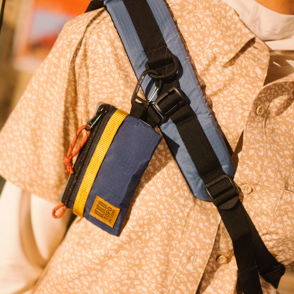 General lookbook image of Mountain Accessory Bag in "Beetle / Midnight"