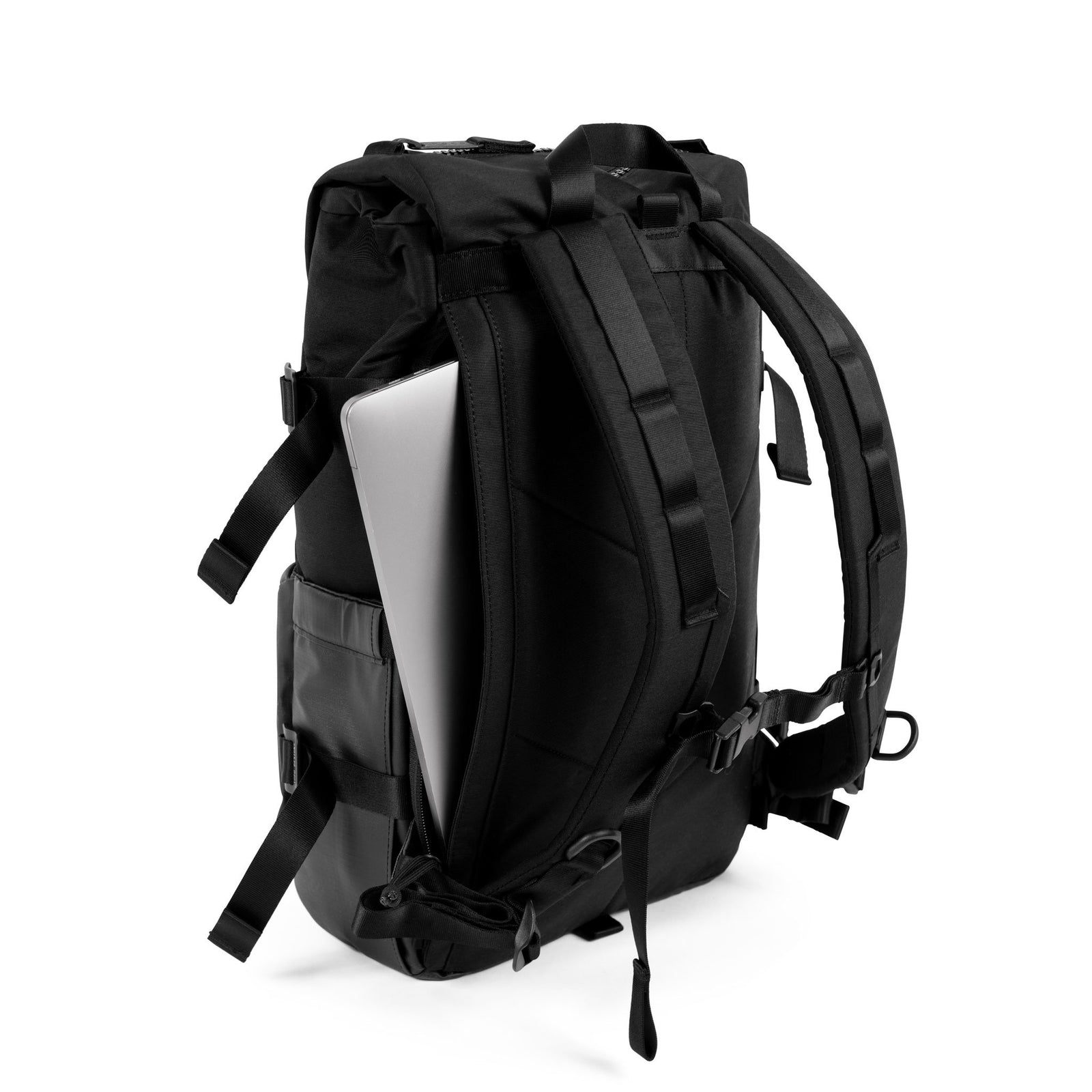 3/4 Back Detail Shot of the Topo Designs Rover Pack Premium showing external access to padded laptop sleeve in "Premium Black".