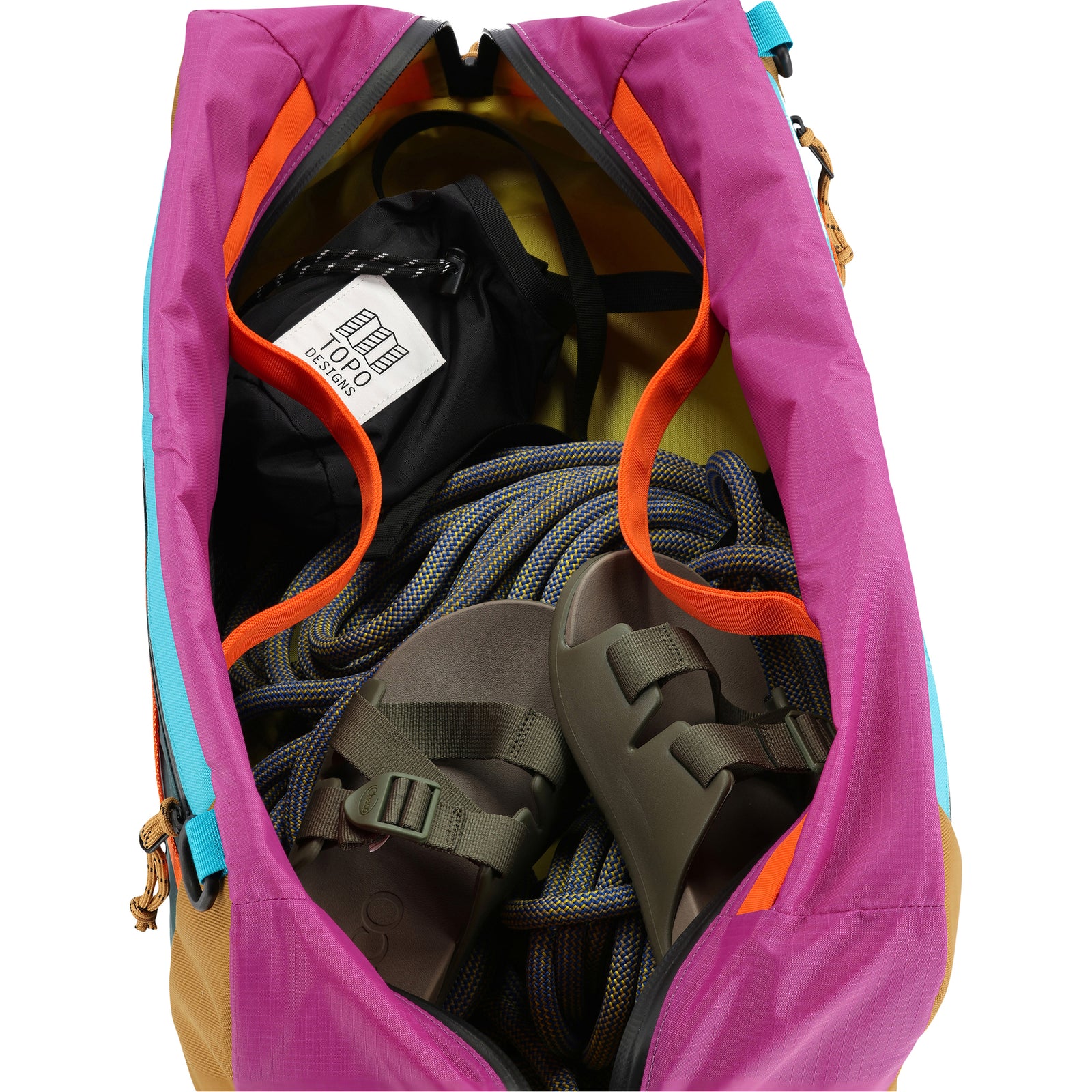 Photo of interior of Topo Designs Mountain Duffel 40L backpack gear bag in recycled "Botanic Green / Grape" nylon.