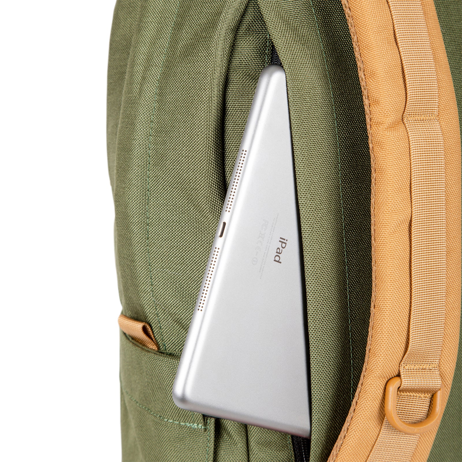 General shot of external laptop sleeve access on back of Topo Designs Daypack Classic 100% recycled nylon backpack for work or school in olive green.