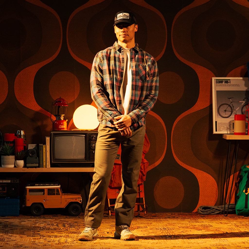 General lifestyle image of Topo Designs Patch Mesh Trucker - Desert Dusk in "Black"