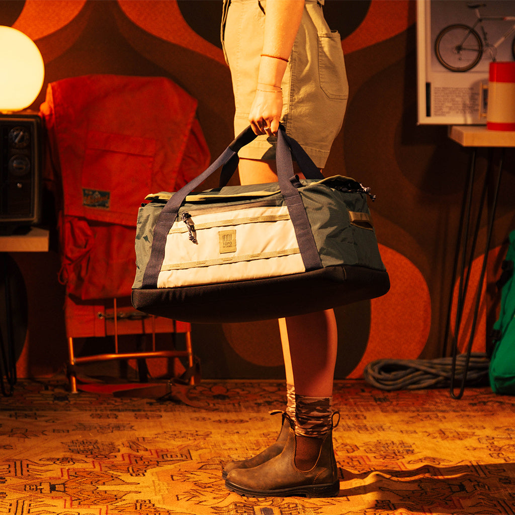 General image of Mountain Duffel 40L in "Forest / Bone White"