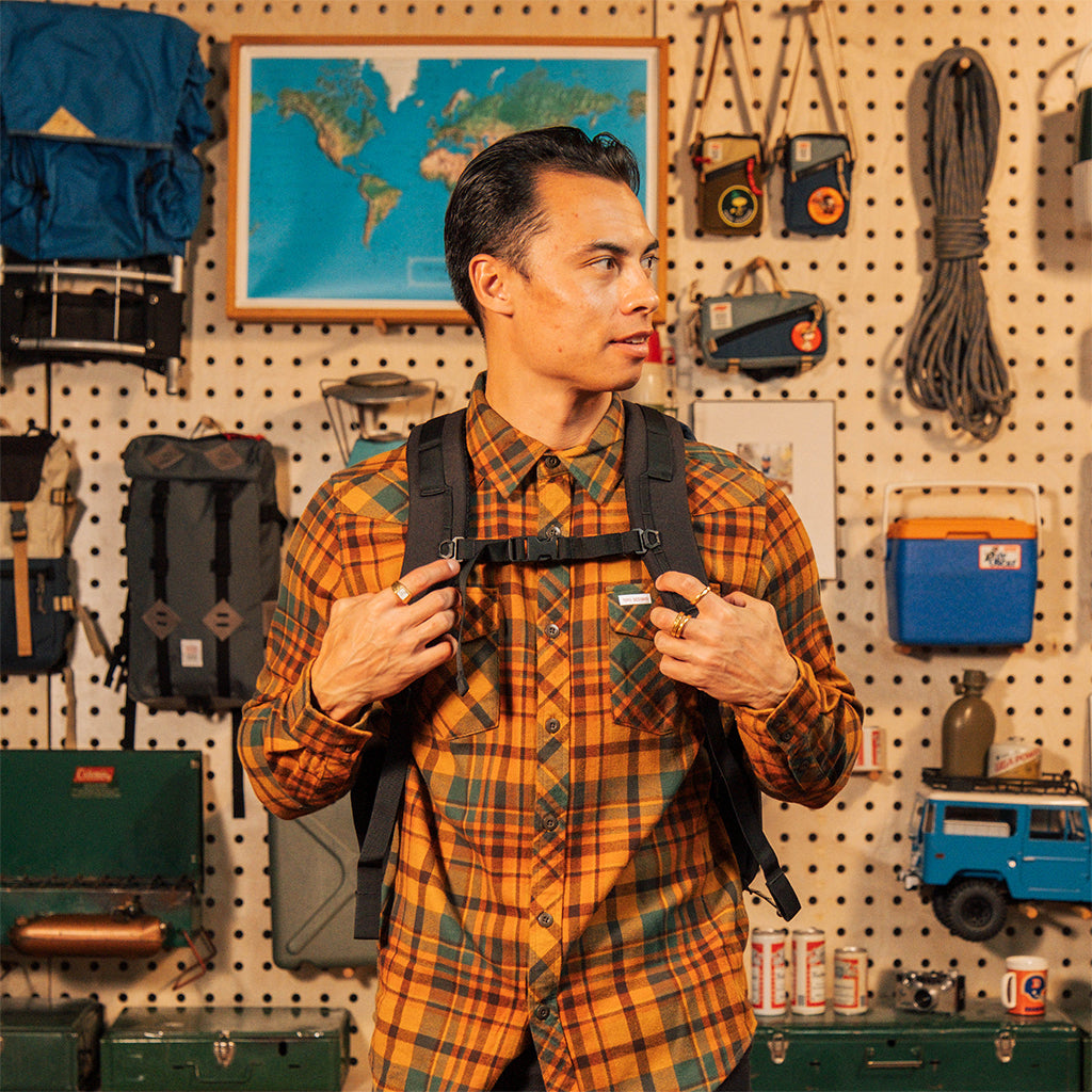 General model shot of Global Travel Bag 30L in "Navy" showing backpack straps