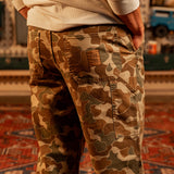 Back image of a man wearing "Duck Camo" Utility Pants [Model is 5'11", wearing size 32]