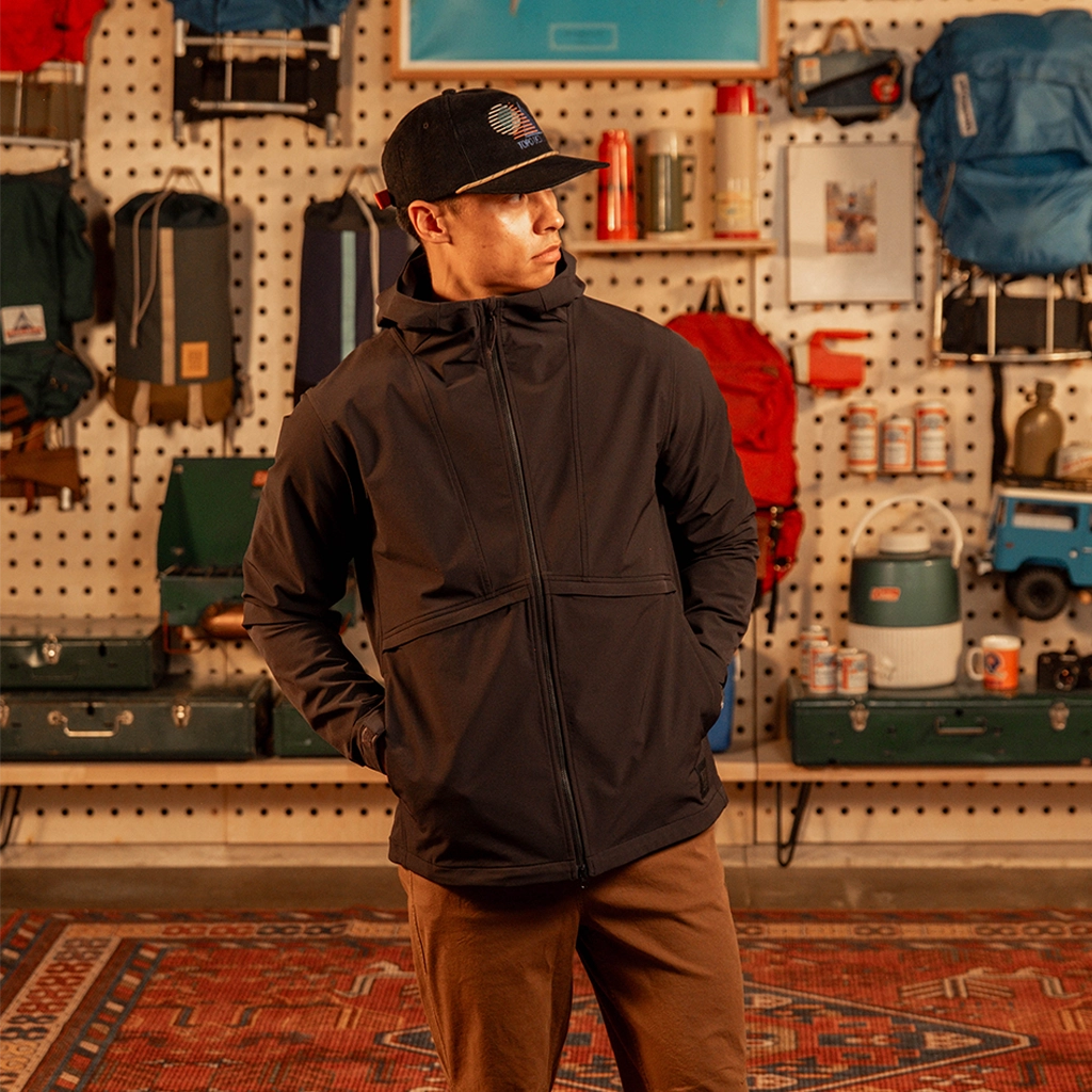 General front view of model wearing HighPeak Jacket in 'Black' [Model is 5'11", wearing size medium]