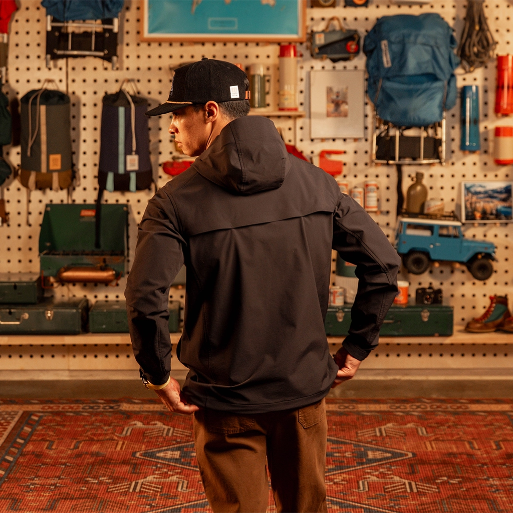 General back view of model wearing HighPeak Jacket in 'Black'