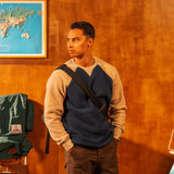 Man standing in a room with a world map on the wall [Model is 5'11", wearing size medium]