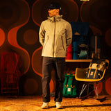 General front image of a man wearing a global jacket in "Oil Green" [Model is 5'11", wearing size medium]