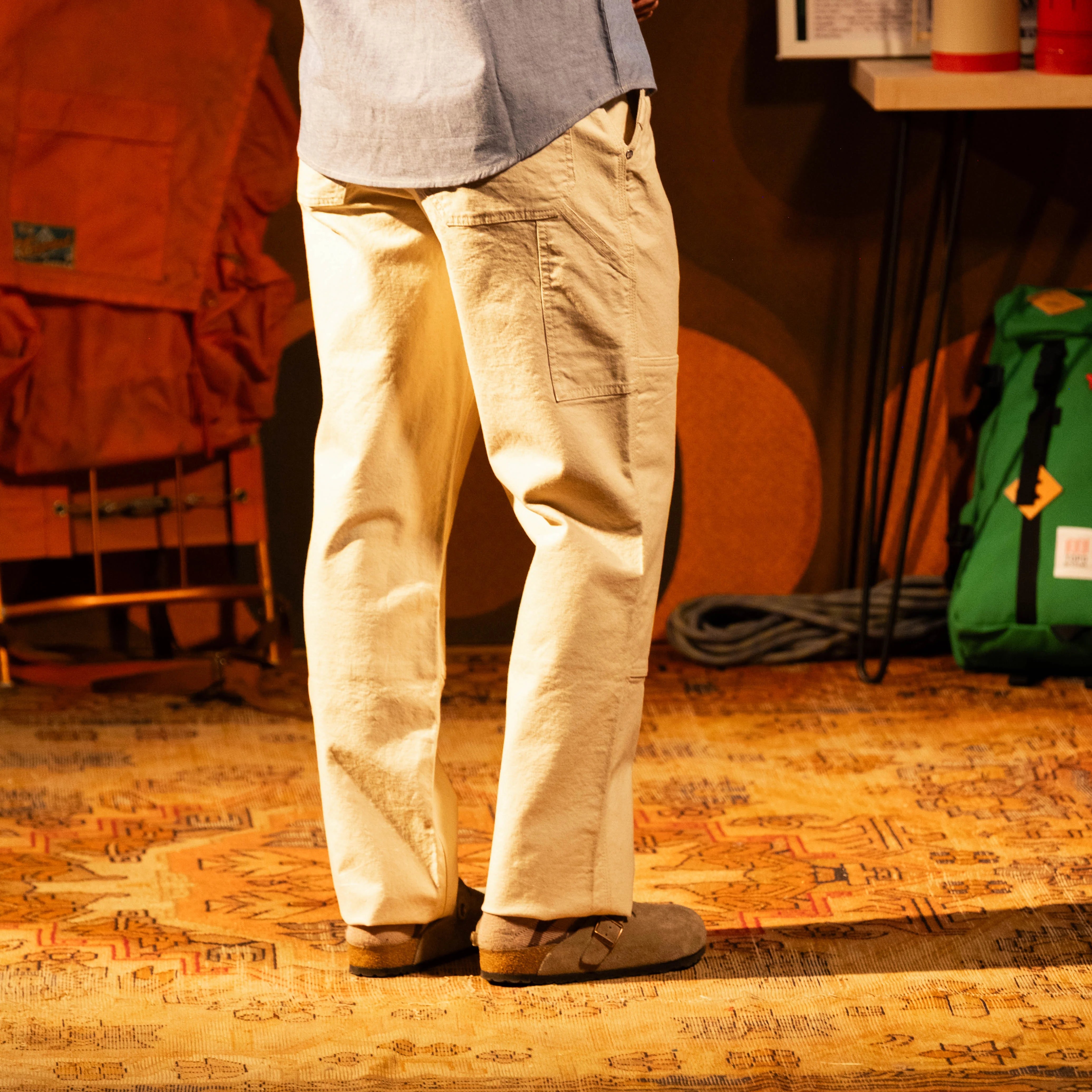 General model shot of Topo Designs Utility Pants Undyed - Men's in "Undyed" [Model is 5'10', wearing size 32]