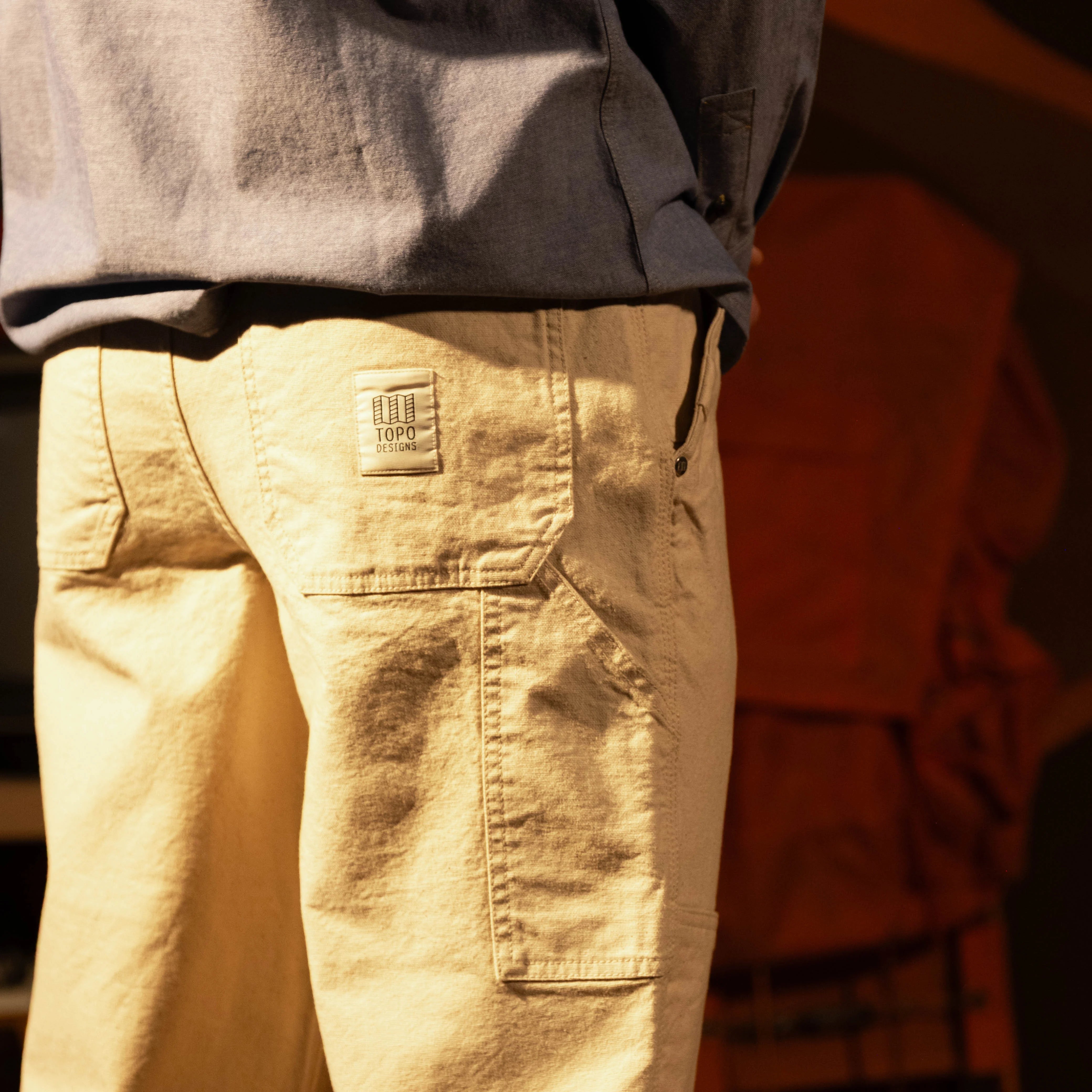 General model shot of Topo Designs Utility Pants Undyed - Men's in "Undyed" [Model is 5'10', wearing size 32]