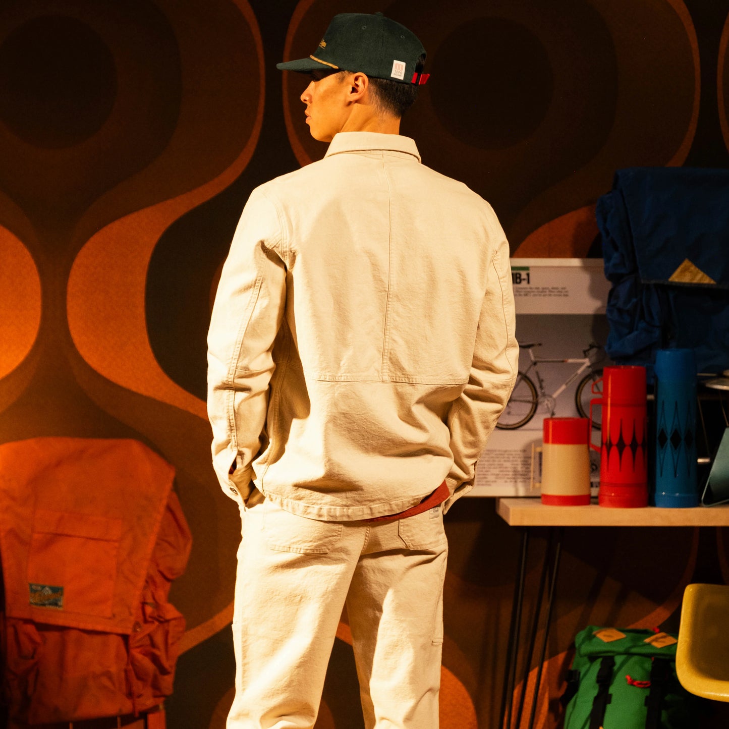 Model shot of Front view of Topo Designs Utility Jacket Undyed - Men's in "Undyed"