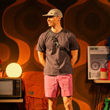 General on model image of Topo Designs Dirt Pocket Tee - Men's in "Black" [Model is 5'11", wearing size medium]