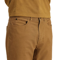 Model shot Topo Designs Dirt 5-Pocket Pants in "Dark Khaki"