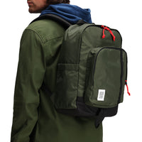 Close up back model shot of Topo Designs Session Pack laptop backpack in "Olive". Show on "Black".