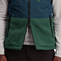 General shot of Subalpine fleece vest in "Forest / Pond Blue"