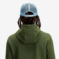 General shot Topo Designs Trucker Hat with mesh back and original logo patch in "Sage"