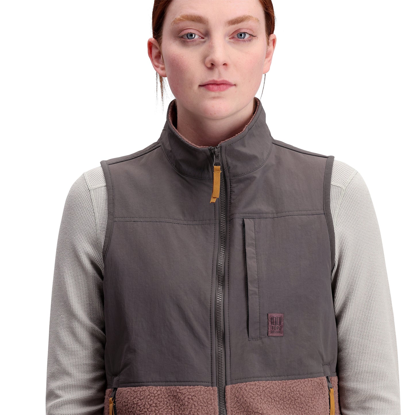 General shot of Women's Subalpine Fleece Vest in "Peppercorn / Charcoal"