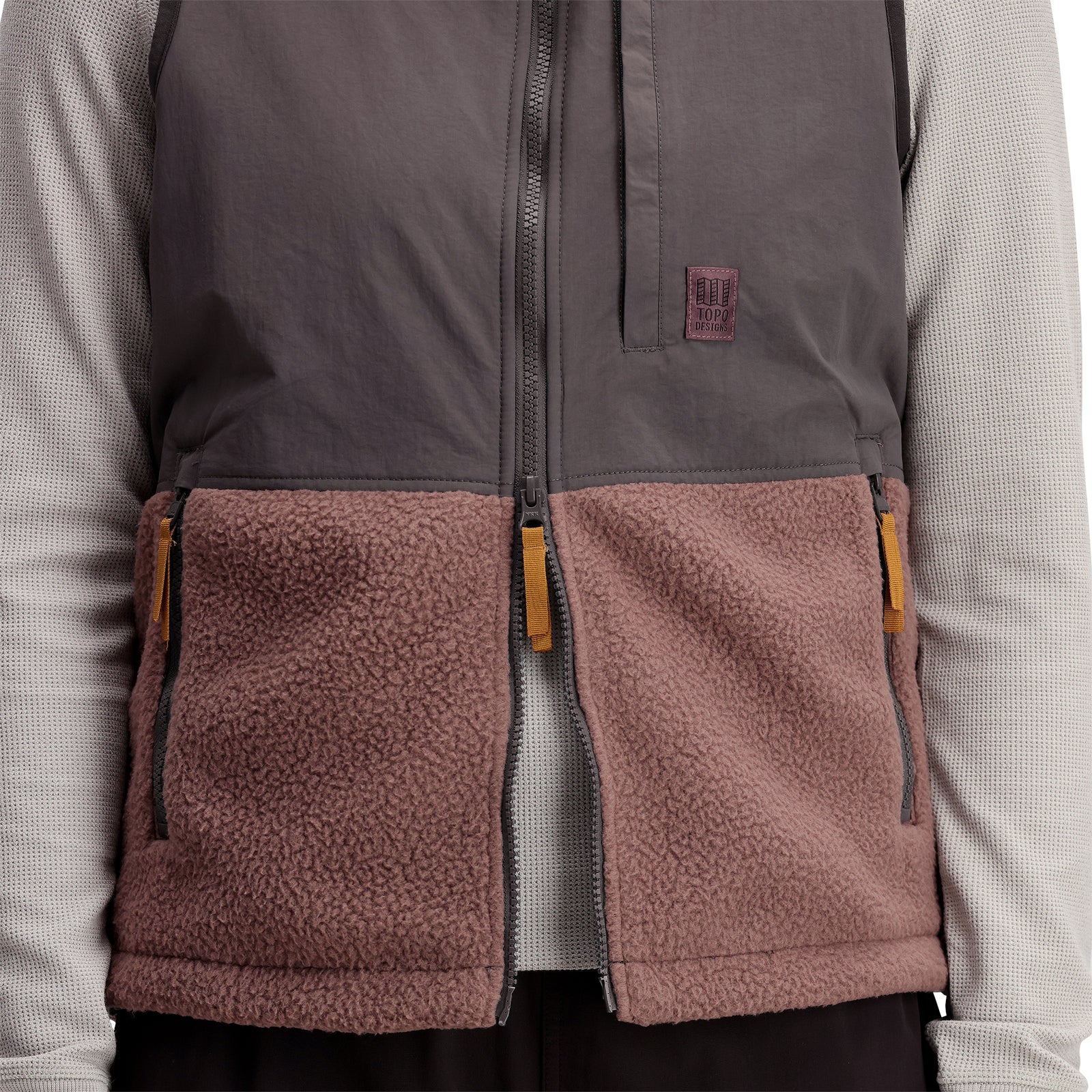 General shot of Women's Subalpine Fleece Vest in "Peppercorn / Charcoal"
