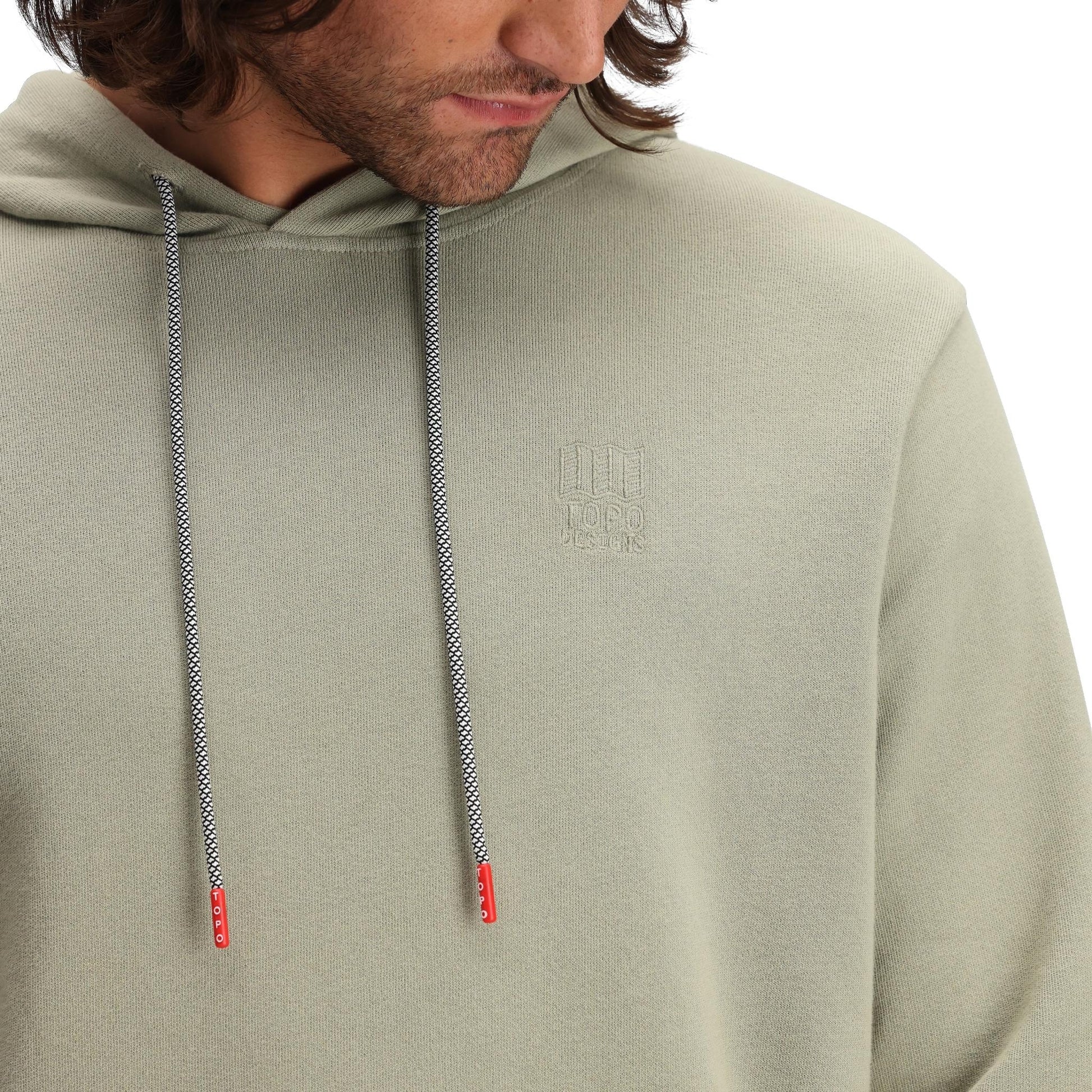 Detail shot of Topo Designs Dirt Hoodie - Men's in "Dried Sage"