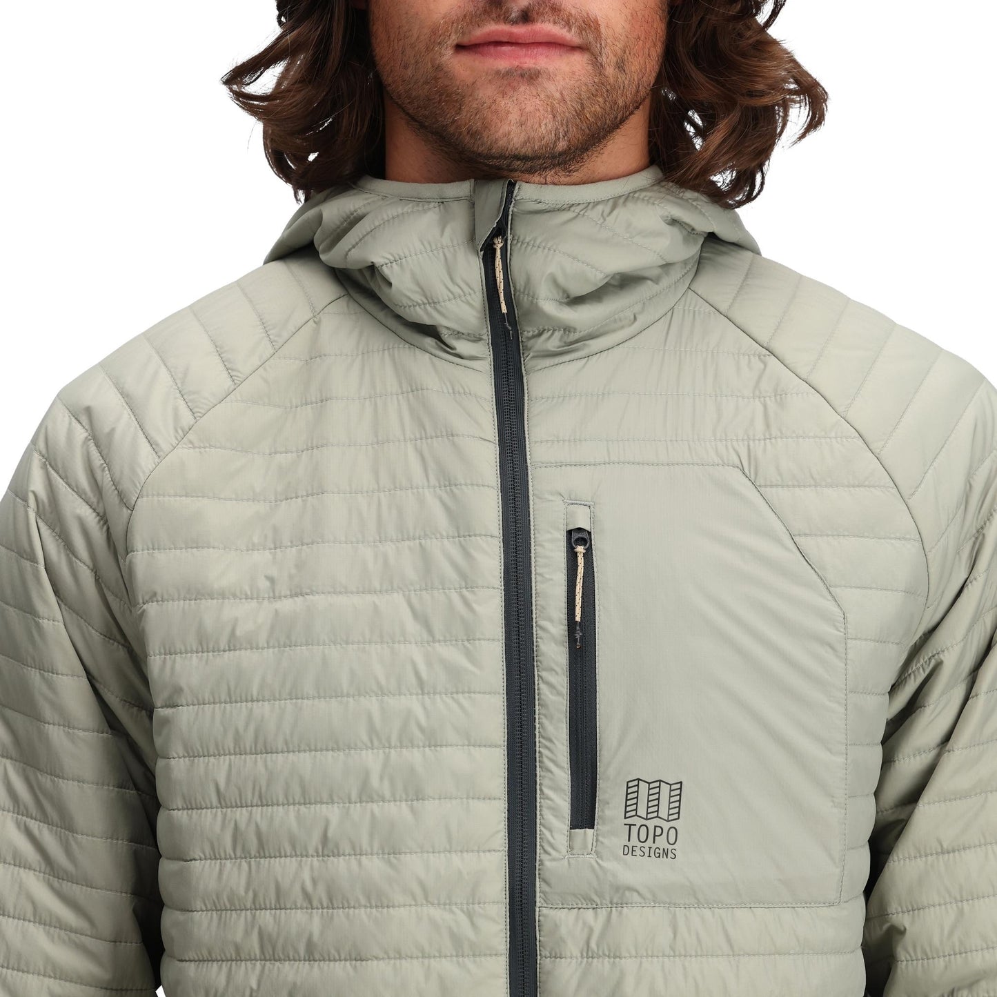 Detail shot of Topo Designs Global Puffer Hoodie - Men's in "Dried Sage"