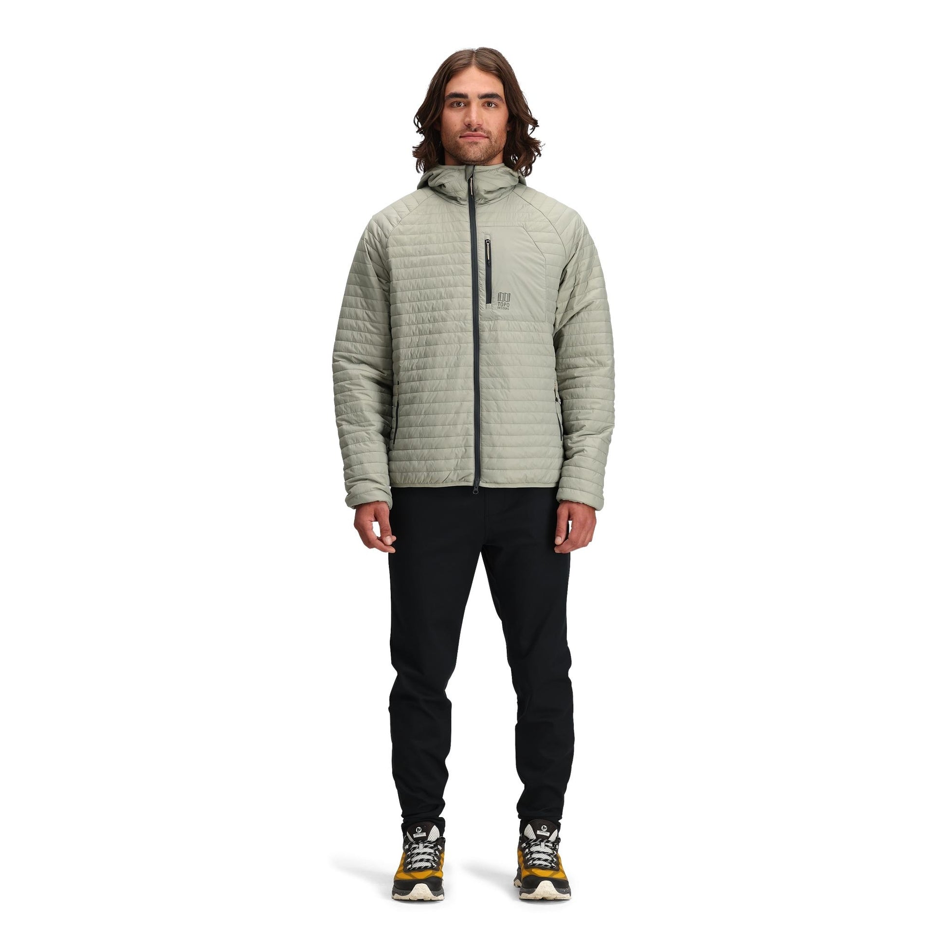 General front model shot of Topo Designs Global Puffer Hoodie - Men's in "Dried Sage"