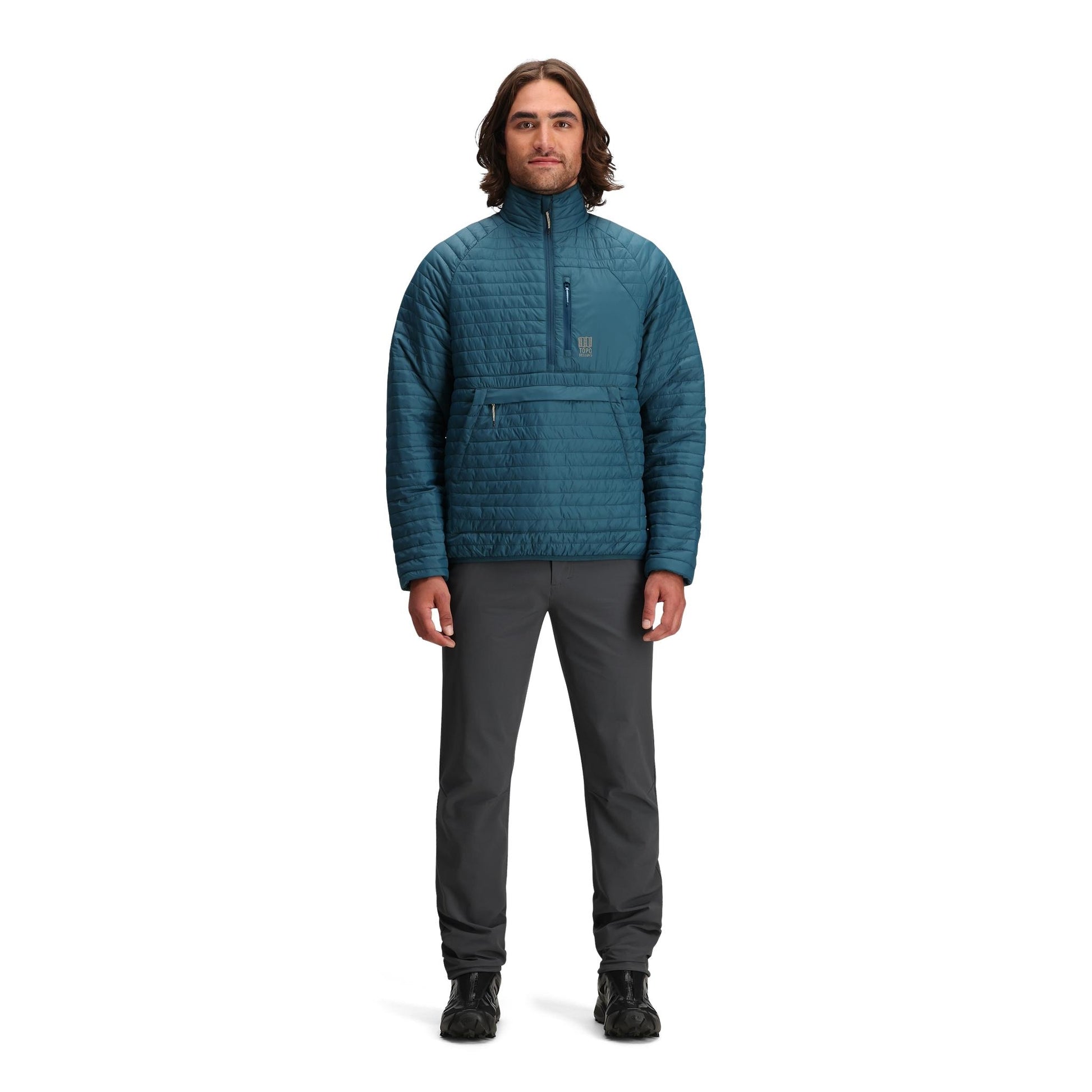 General front model shot of Topo Designs Global Puffer Pullover - Men's  in "Pond Blue"