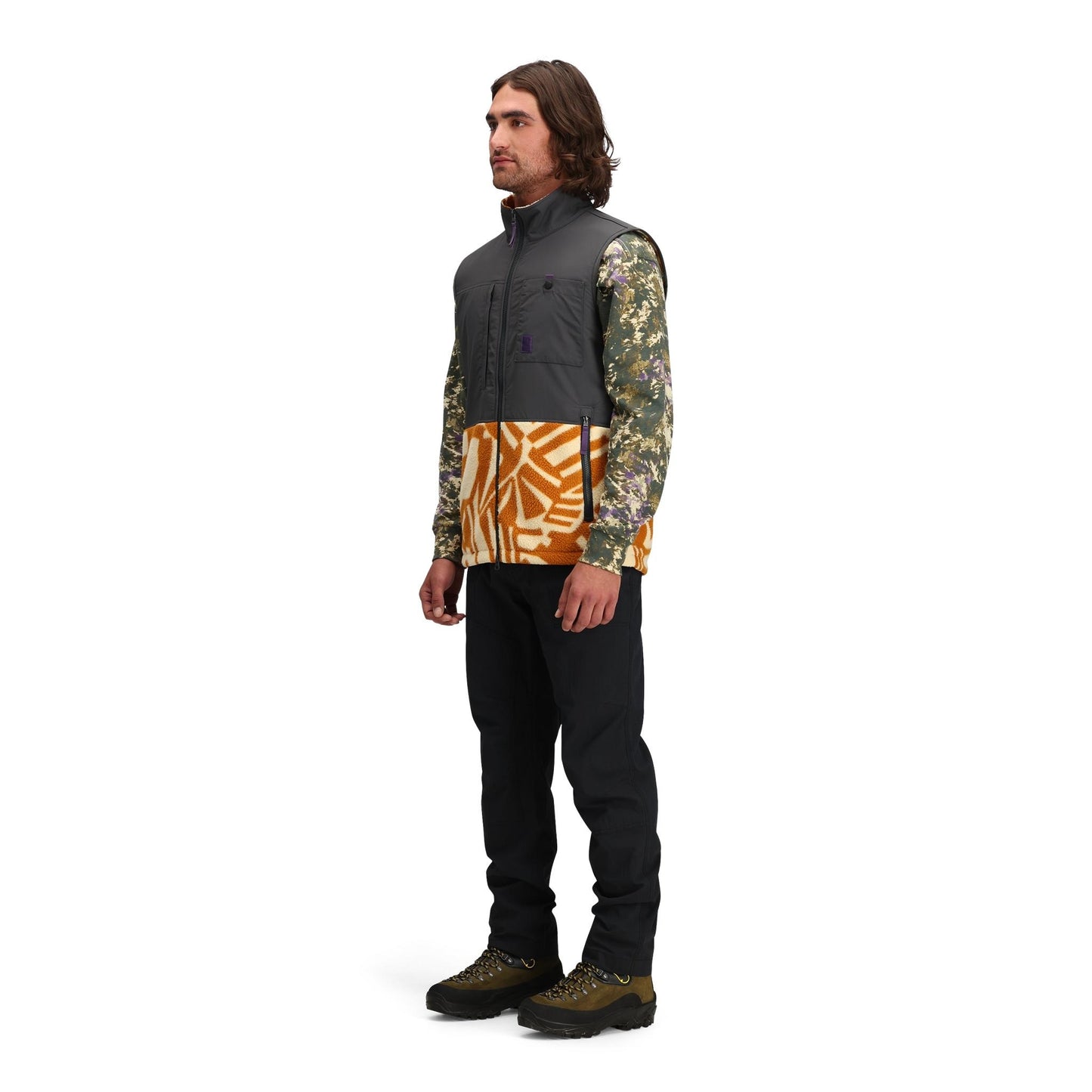 General side model shot of Topo Designs Subalpine Fleece Vest - Men's in "Zion Spice / Asphalt"