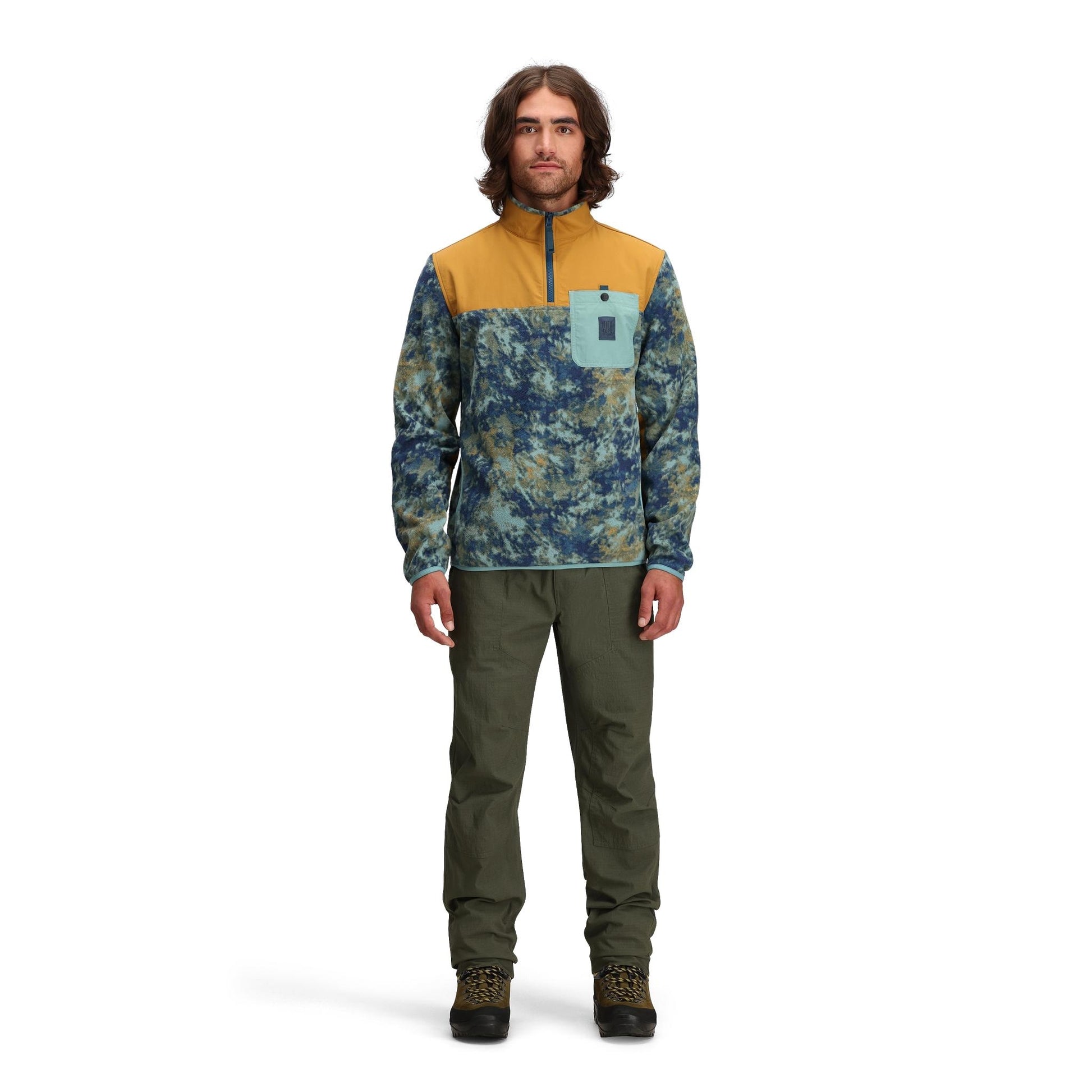 General front model shot of Topo Designs Vista 1/4 Zip Lightweight Fleece - Men's in "Pond Blue Storm / Khaki"