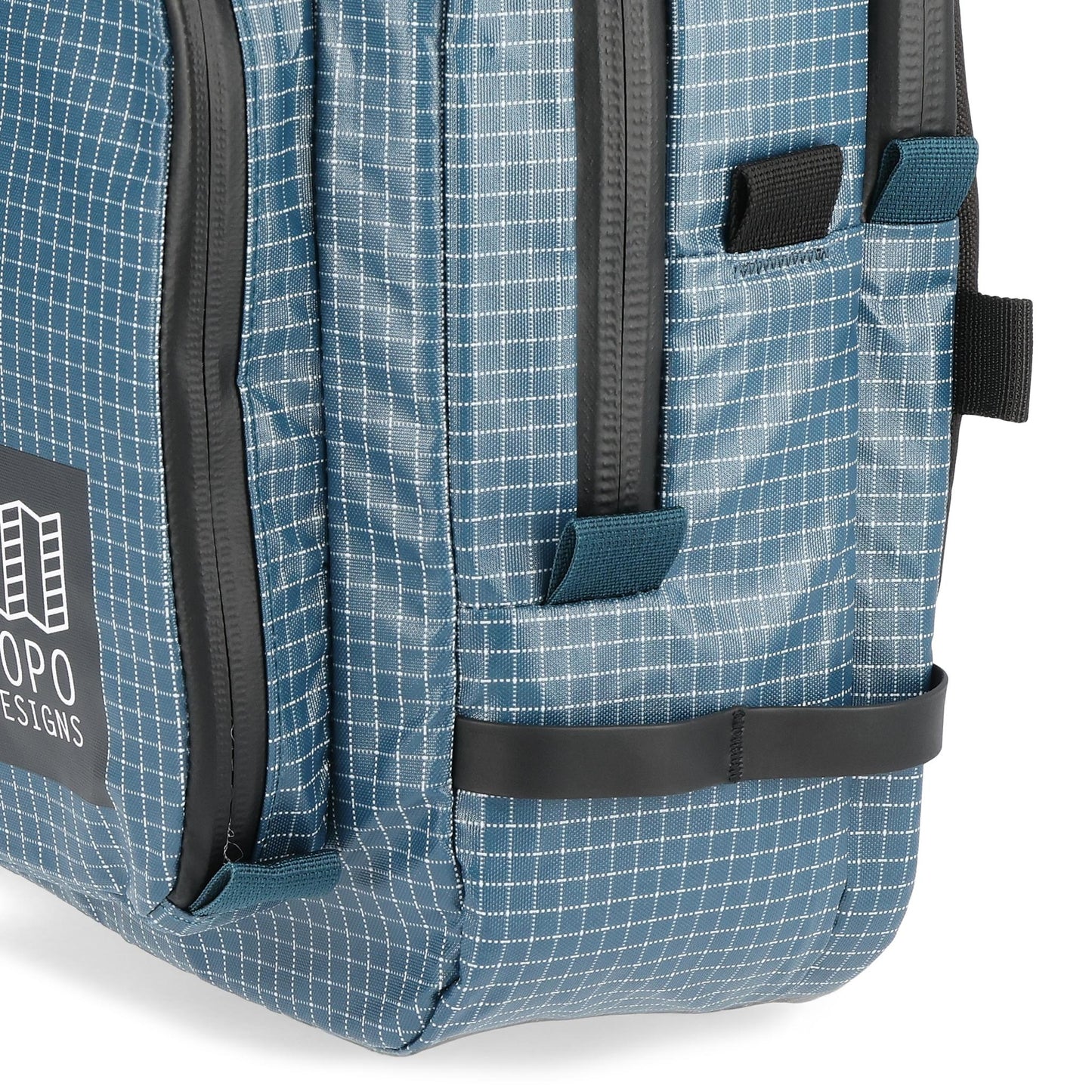 General detail shot of Topo Designs Apex Briefcase in "Pond Blue Grid"