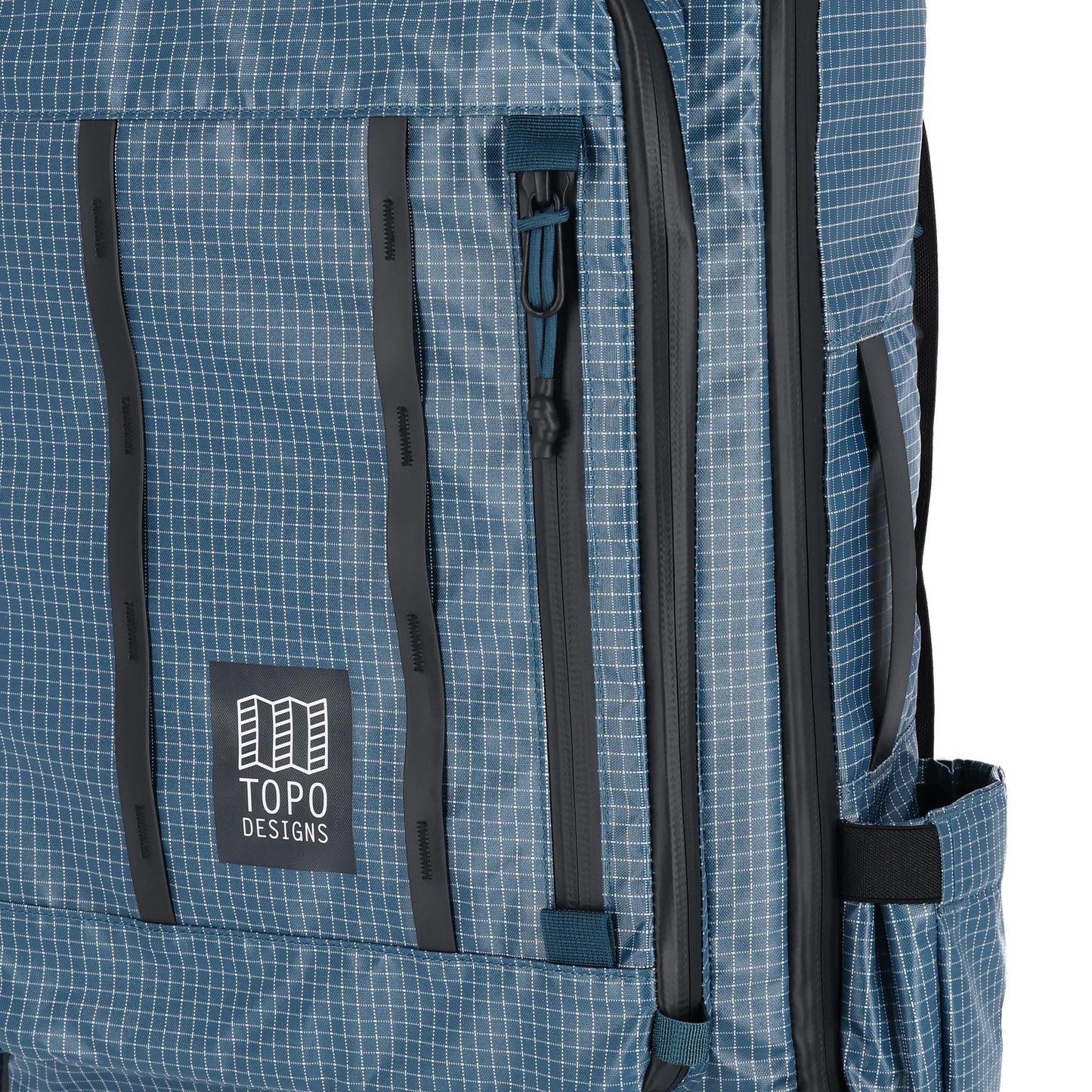 General detail shot of Topo Designs Apex Travel Bag 30L  in "Pond Blue Grid"