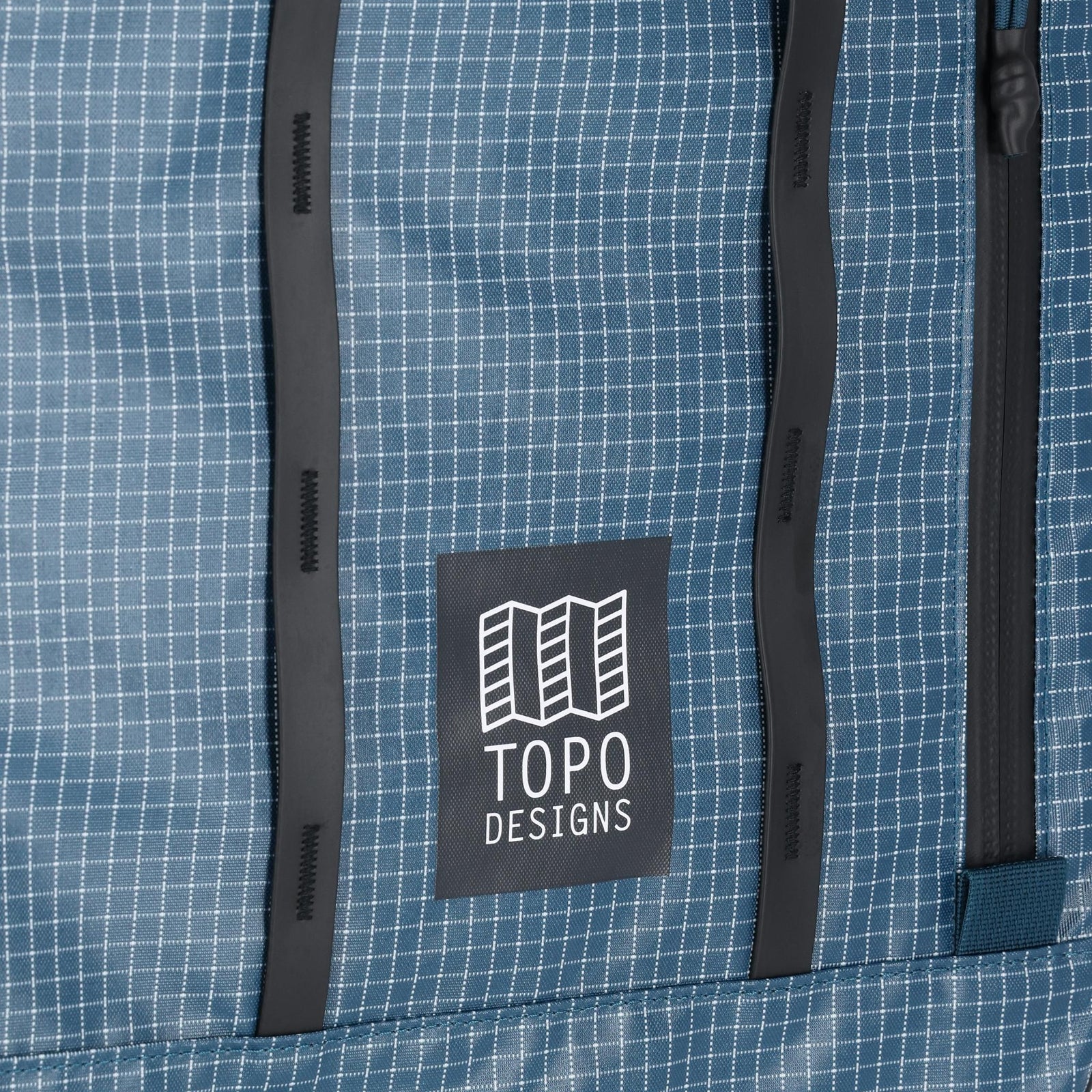 General detail shot of Topo Designs Apex Travel Bag 30L  in "Pond Blue Grid"