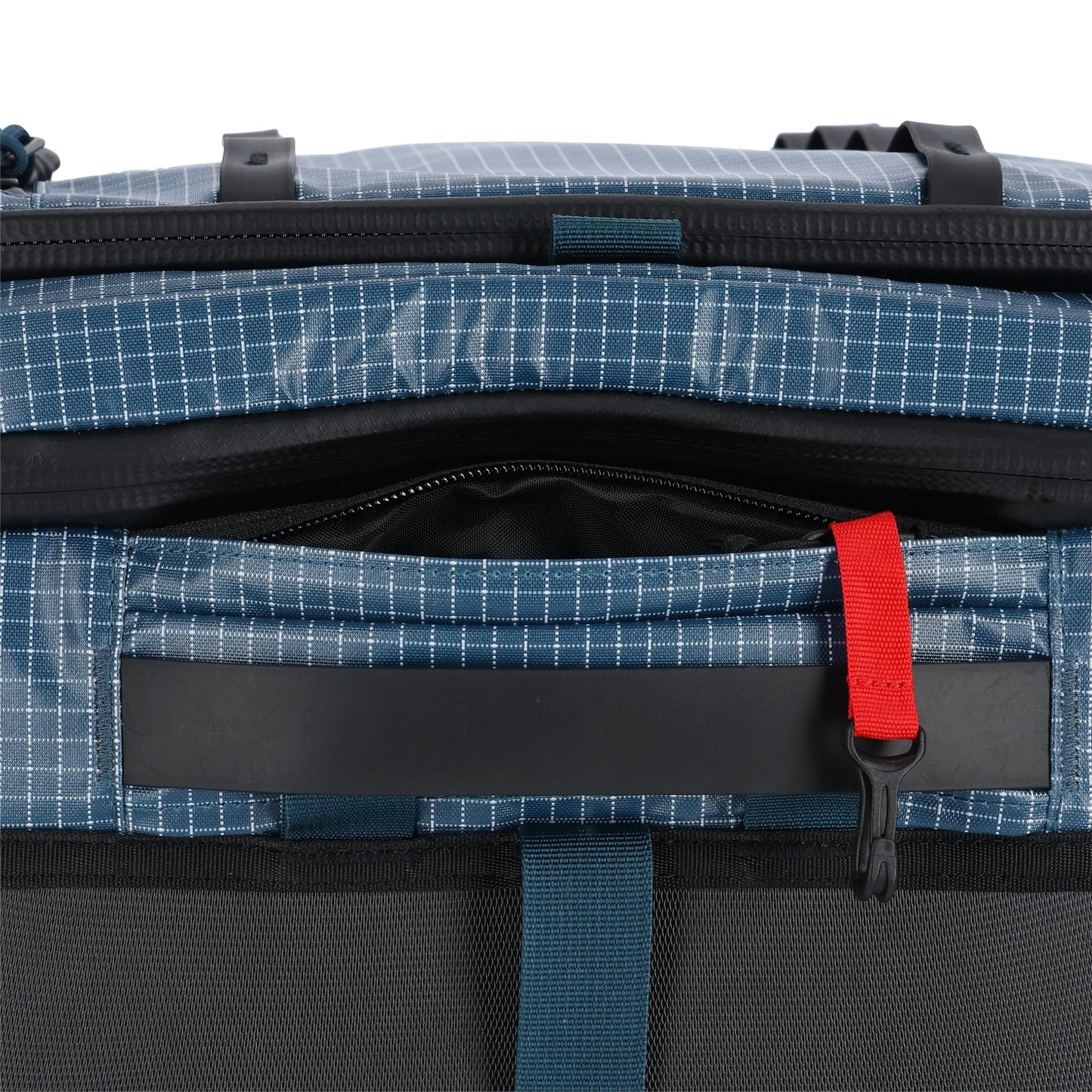 General detail shot of Topo Designs Apex Travel Roller Bag in "Pond Blue Grid"