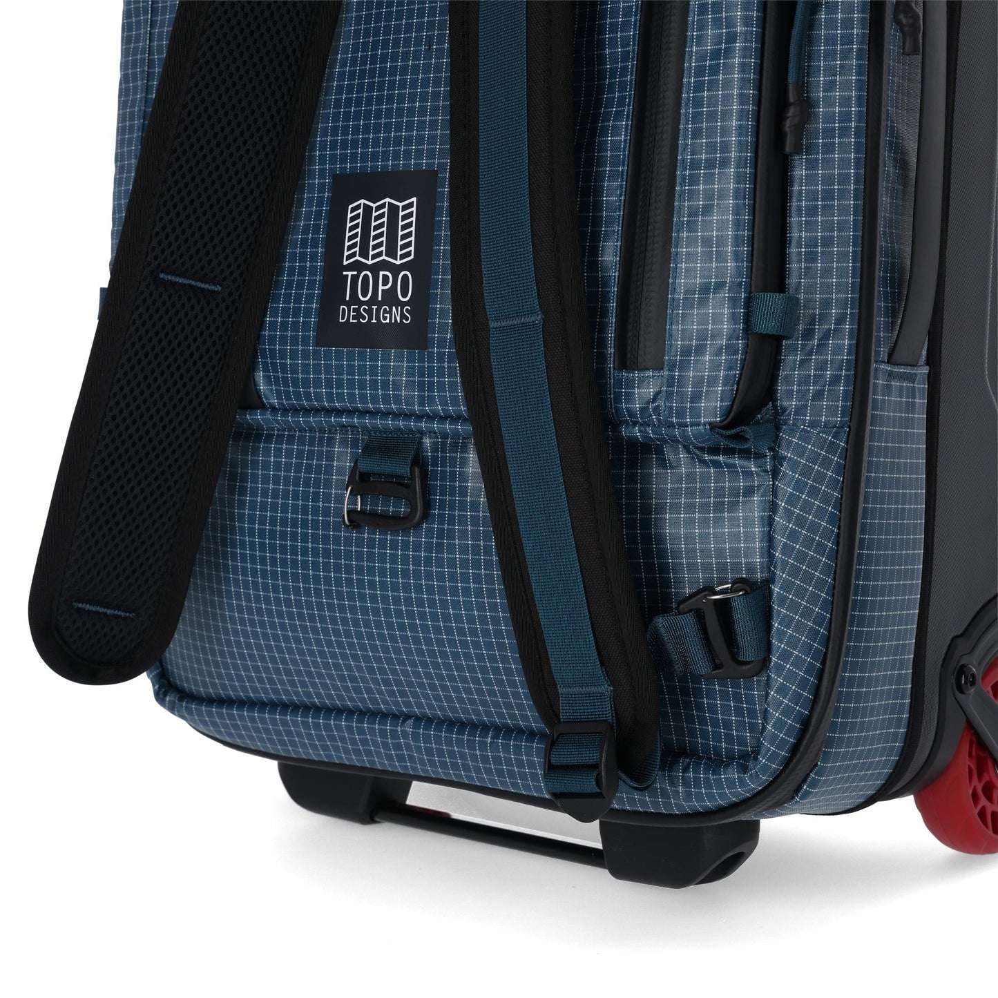 General detail shot of Topo Designs Apex Travel Roller Bag in "Pond Blue Grid"