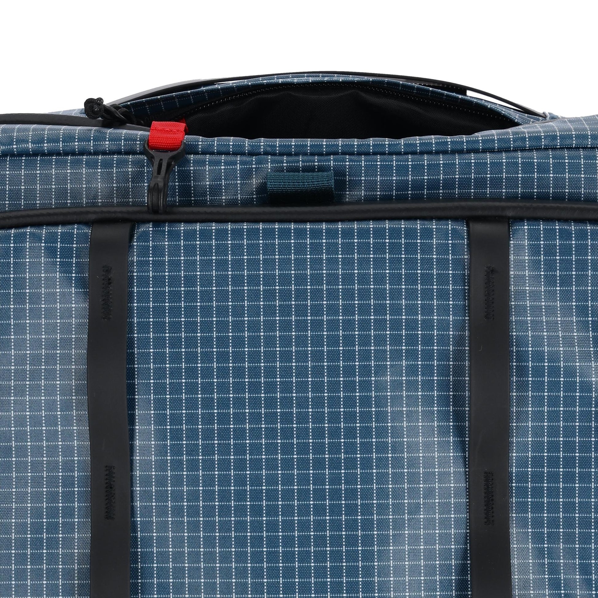 General detail shot of Topo Designs Apex Travel Roller Bag in "Pond Blue Grid"