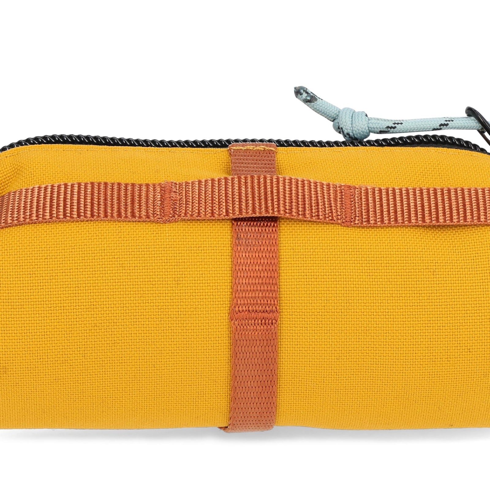 Detail shot of Topo Designs Burrito Bag in "Mustard"