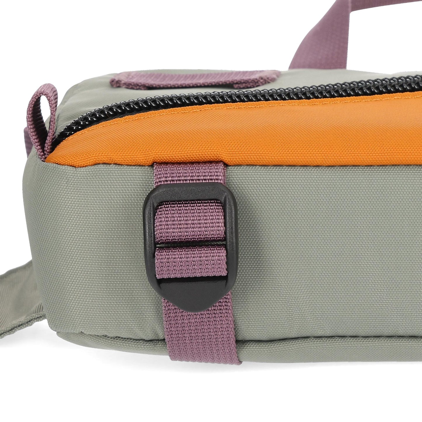 Detail shot of Topo Designs Mini Quick Pack in "Beetle / Spice"