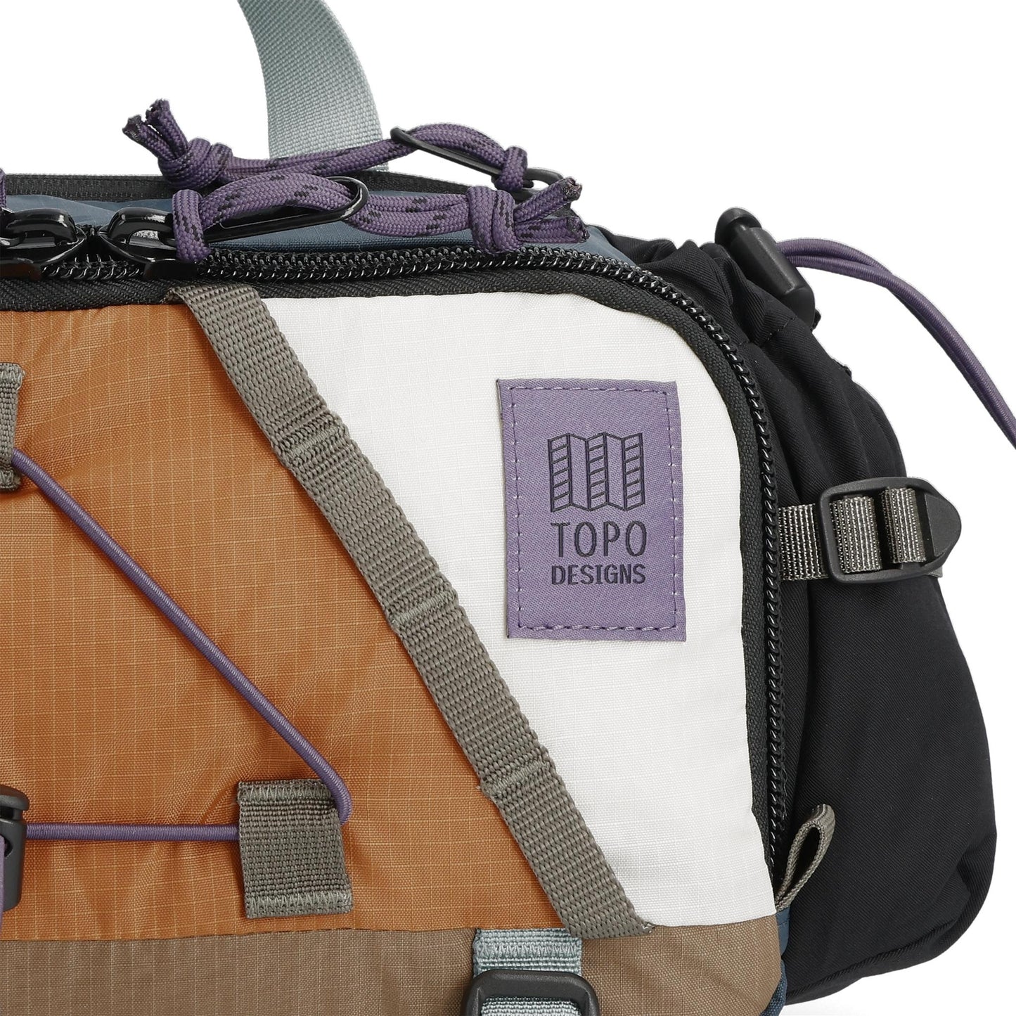 Detail shot of Topo Designs Mountain Hydro Hip Pack in "Pond Blue / Spice"