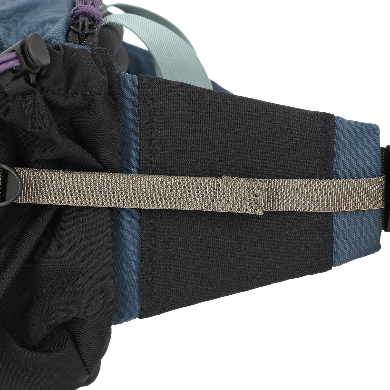 Detail shot of Topo Designs Mountain Hydro Hip Pack in "Pond Blue / Spice"