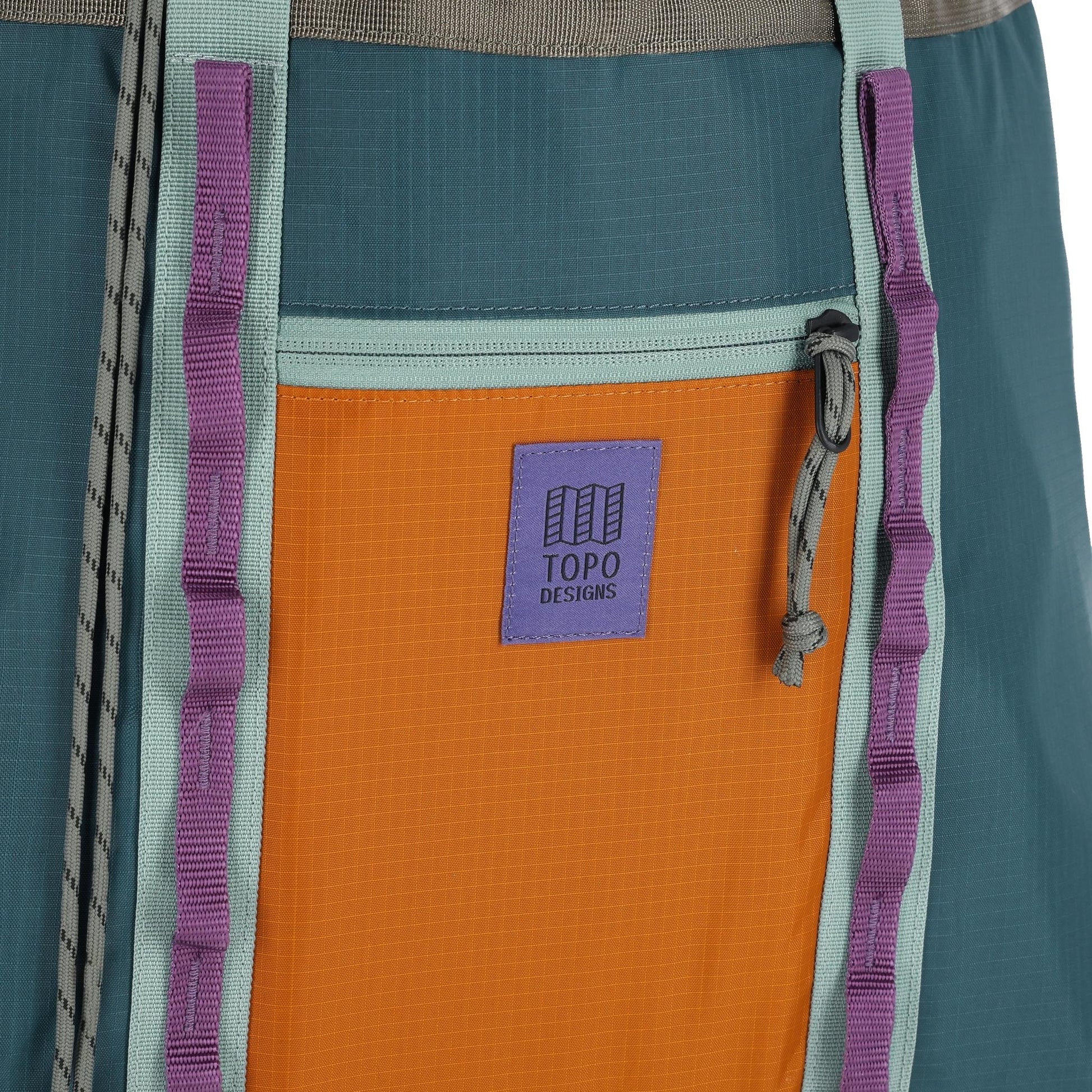 Detail shot of Topo Designs Mountain Utility Tote in "Pond Blue / Spice"