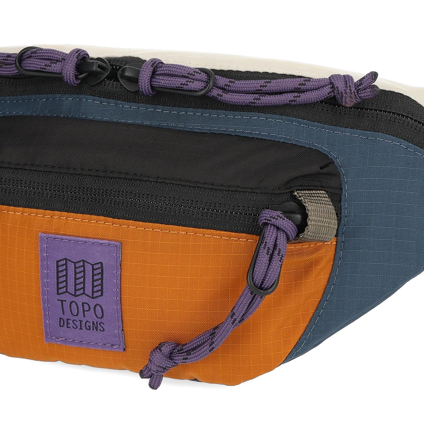 Detail shot of Topo Designs Mountain Waist Pack in "Pond Blue / Spice"