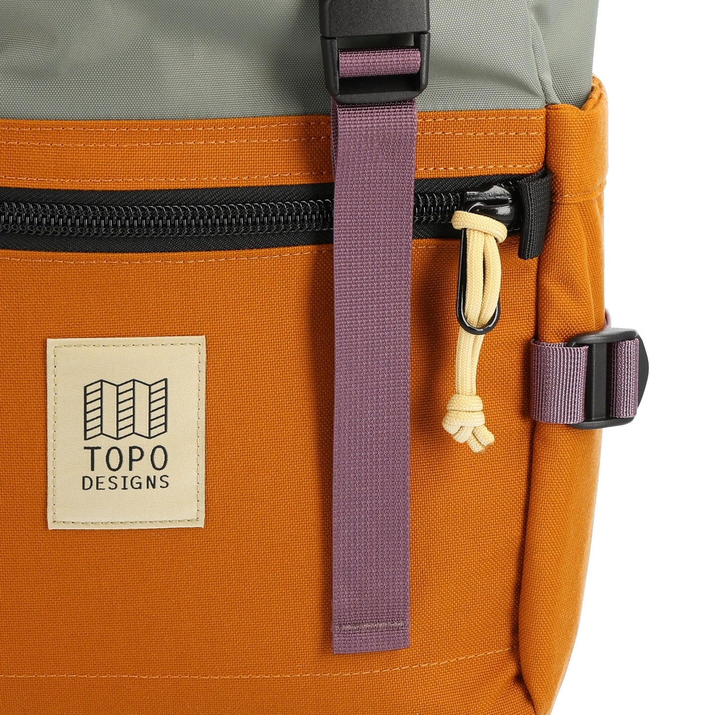 Detail shot of Topo Designs Rover Pack Classic in "Beetle / Spice"