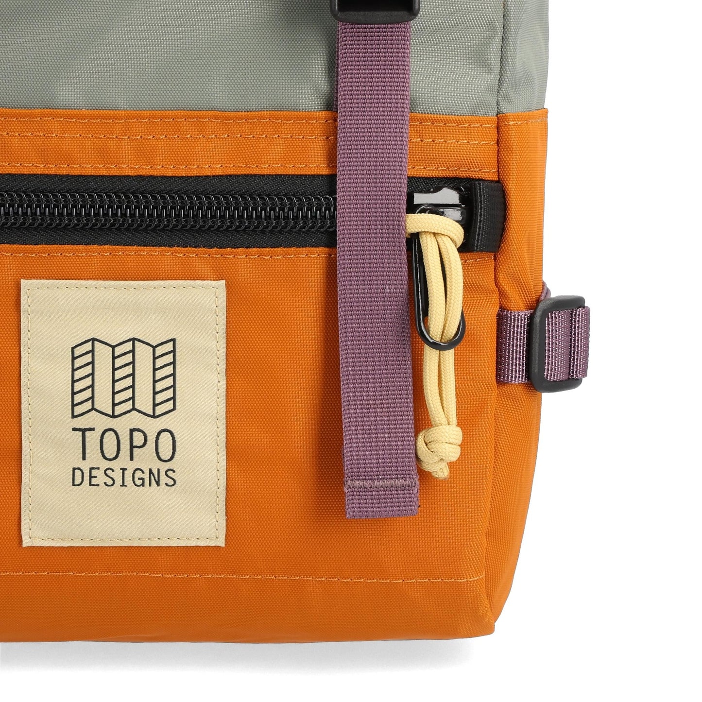 Detail shot of Topo Designs Rover Pack Mini in "Beetle / Spice"