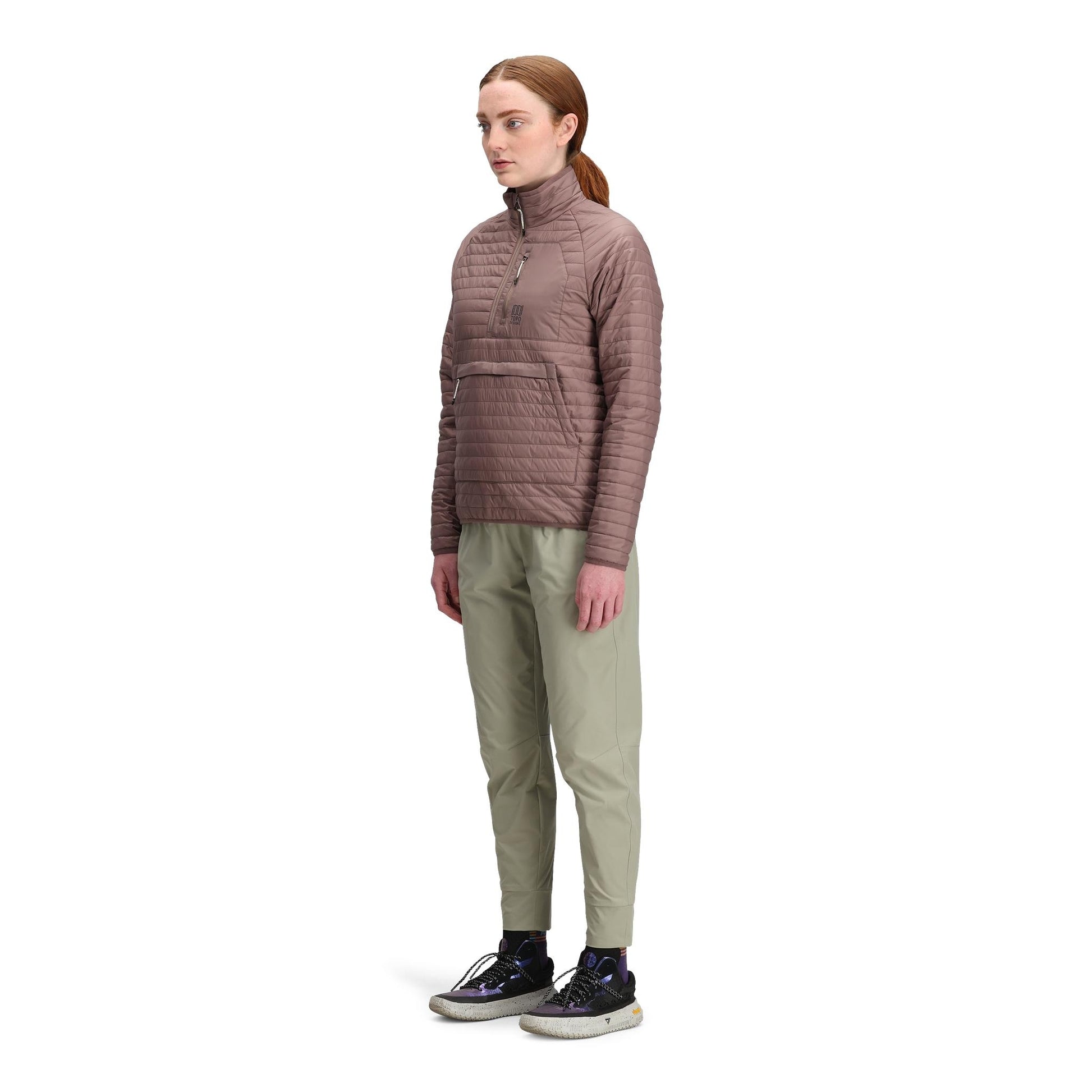 General side model shot of Topo Designs Global Puffer Pullover - Women's  in "Peppercorn"