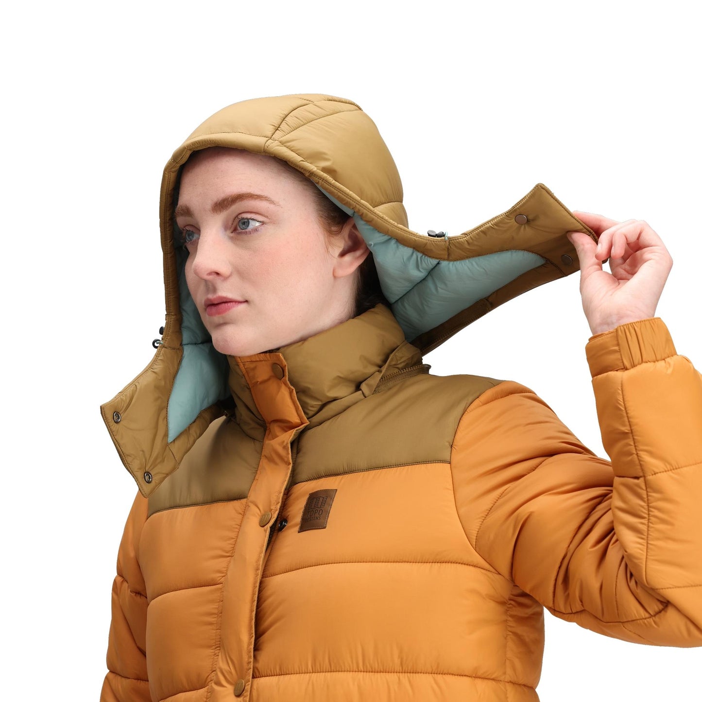 General Detail shot of Topo Designs Retro Ridge Puffer Jacket - Women's  in "Dark Khaki / Spice"