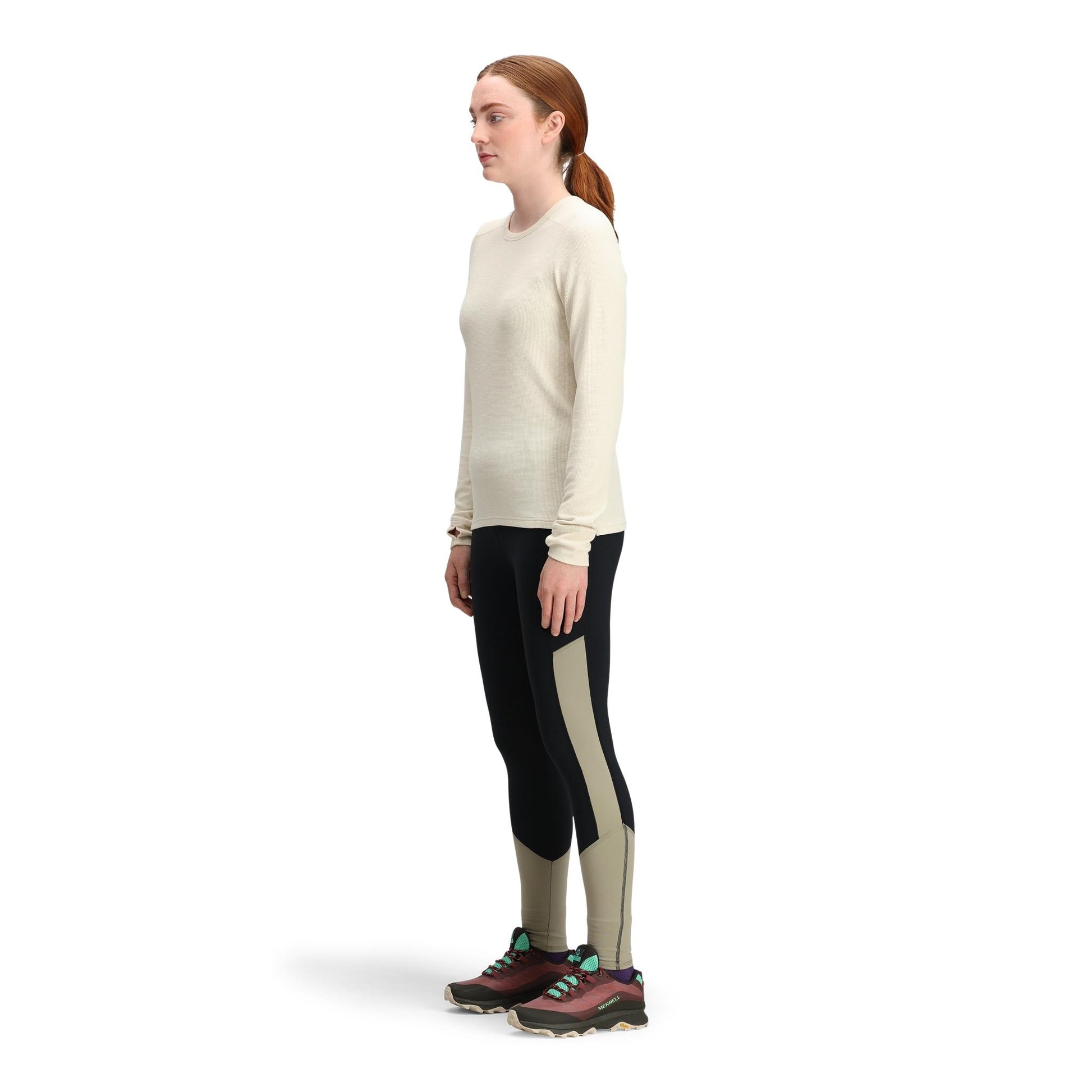 General side model shot of Topo Designs Global Waffle Crew - Women's in "Bone White"