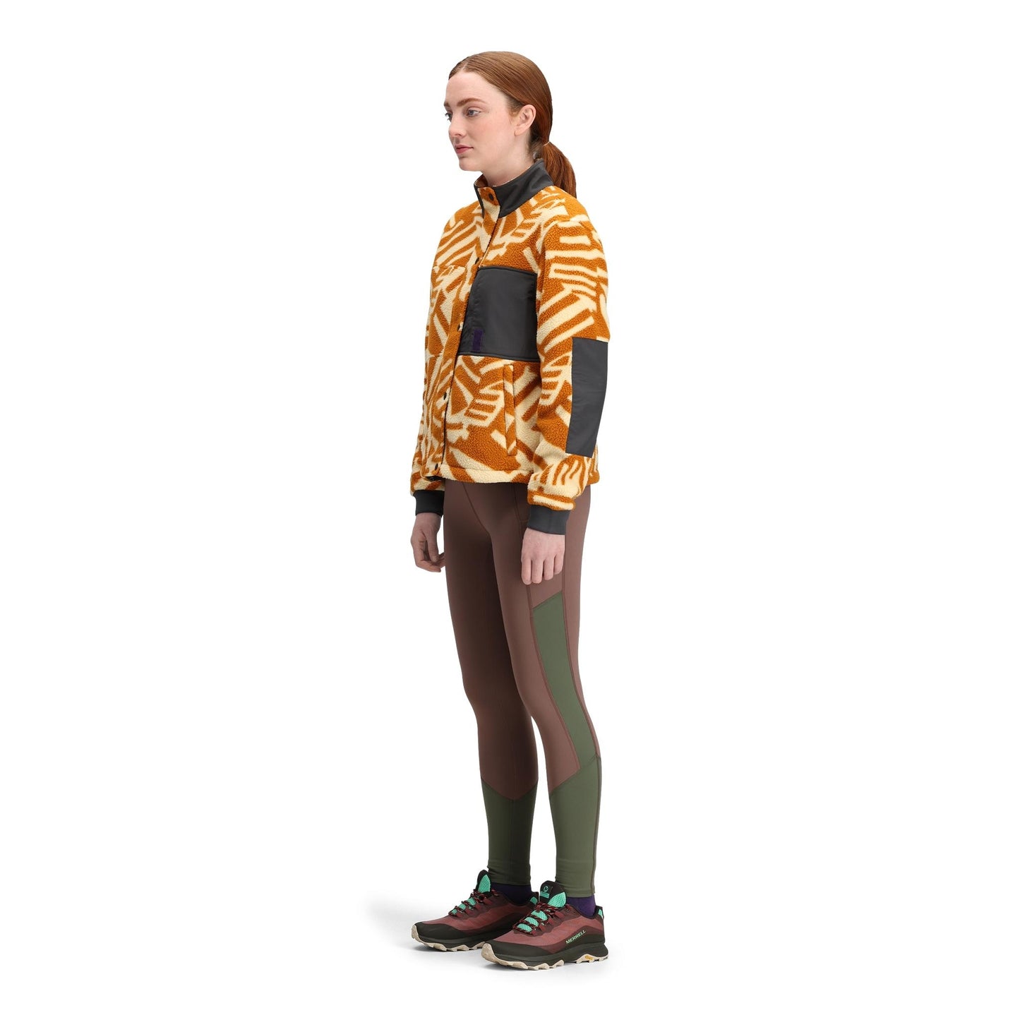 General side model shot of Topo Designs Summit Rise Full Zip Jacket - Women's in "Zion Spice / Asphalt"