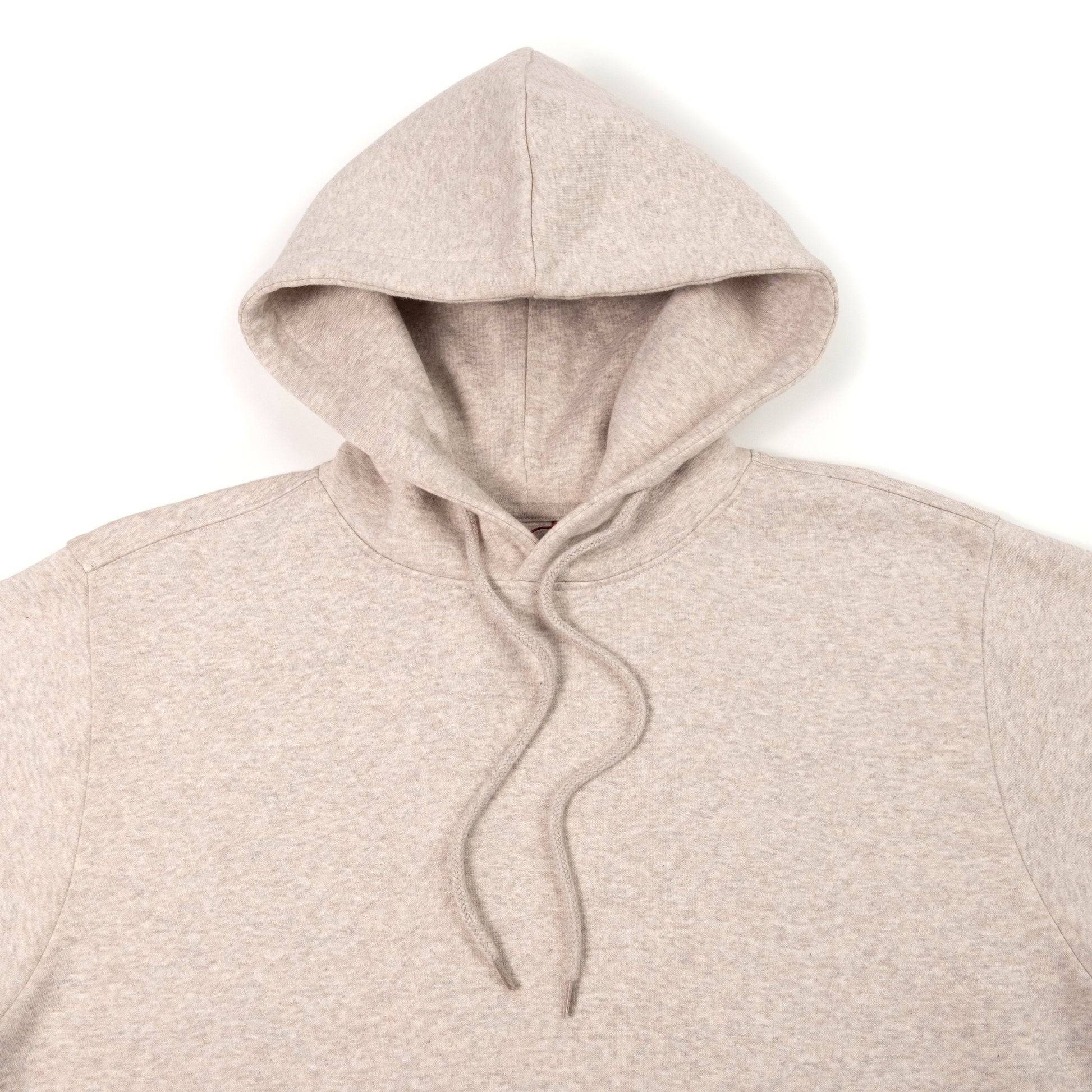 General Detail shot of Topo Designs Alpine High Label Hoodie in "Oatmeal Heather"